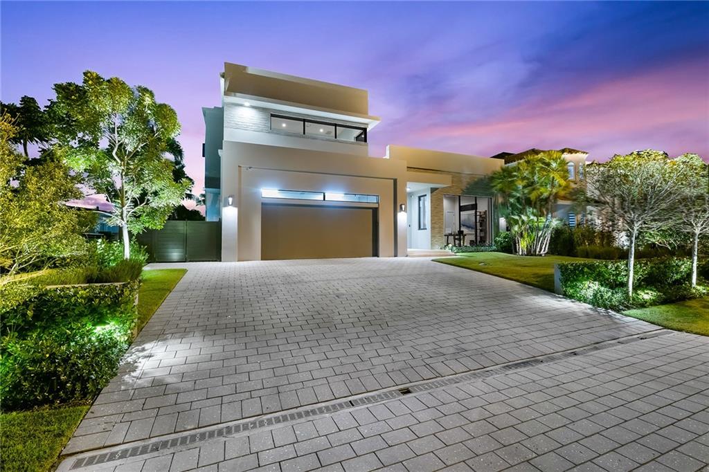 Welcome to Lauderdale Harbors a beautifully secluded three island community with just under 200 waterfront homes on the Stranahan River! Step into this custom built 4 bed 4 bath home and you'll notice the 10-14' ceilings and elegant porcelain tile resembling the oceans floor! Beyond the airy open floor plan you'll find the kitchen walls lined with custom Astra Italian Cabinetry accented by Miele appliances and covered in a custom porcelain countertop. This unique smart home features a wired security system, built-in Sonos sound system, automated window shades, custom gas fireplace with wireless controls, gas heated saltwater pool & spa among many other features! Stepping outside onto the 70' of elevated solid concrete dock space you'll find a custom 16,000lb. boat lift & 30' floating dock. Please visit 1707FortLauderdale.com for additional photos, video and detailed information regarding this home.