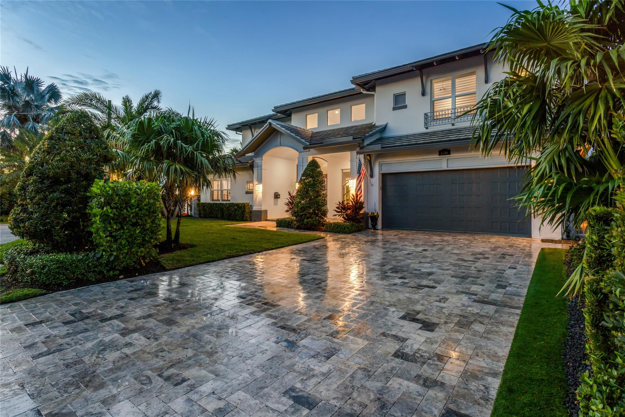 Coastal-Inspired Deepwater Estate sited one lot off the Intracoastal on 85' of waterfrontage. Formal foyer entrance with soaring ceilings & light-filled interiors. Gourmet chef's kitchen with luxe appliances, quartz countertops & gas cooktop. First floor living includes two bedrooms w/en-suite baths. Second floor master suite with dual closets, dual vanities & glass enclosed shower. Three additional bedrooms upstairs all w/en-suite baths. Other features include fireplace, cabana bath, upstairs family room, 2 bay garage & porcelain tile floors throughout and is generator ready. Outdoor entertaining awaits at the south-facing, heated saltwater pool with spillover spa, while boating enthusiasts will enjoy the 60’ concrete dock offering quick access to the Hillsboro and Boca Raton Inlets. PROPERTY:  On a canal directly off the Intracoastal Waterway, a paved driveway circles around a landscaped oasis creating a dramatic approach, while outdoor entertaining awaits on the covered loggia that flows out to the sun-splashed, heated, saltwater pool with a spillover spa set within a stone-paved patio. Offering 85± feet of deepwater frontage and a 60-foot full-service concrete dock, boating enthusiasts appreciate no-fixed-bridges easy access to the ocean through both the Boca and Hillsboro Inlets. RESIDENCE: Coastal-inspired elegance defines the essence of this chic deepwater custom estate, one parcel off the Intracoastal with 85 feet of waterfrontage. Built in 2021 with six bedrooms and 5,512± total square feet, the grand two-story foyer, with a dramatic floating glass stairway, introduces the light-filled main living room with an inviting fireplace, along with a gracious dining area featuring a built-in serving buffet. In a seamless open-concept plan, the adjoining chef's island kitchen is finished with white Shaker-style cabinetry, quartz countertops, premium GE Monogram appliances and a breakfast nook with banquette seating. Fronted by window walls of impact glass and a set of French doors that open to the loggia, this entire living area overlooks the scenic waterway. First floor living is complete with two ensuite guest bedrooms, while upstairs, a loft area connects three ensuite guest bedrooms and the primary suit. Light, bright and tranquil, the primary bedroom is topped with a triple tray ceiling and features water-view impact-glass windows and a set of sliding doors that open to the balcony overlooking the pool and waterway. The suite comprises dual closets and a spa-like bathroom with dual sinks, a freestanding soaking tub and a glass-enclosed walk-in shower. Completing the overall layout are a cabana bath, laundry room and two-bay garage, with additional details that include porcelain-tile wood-look floors throughout and generator-ready accommodation. LOCATION:  1580 Southeast 8th Street, East Deerfield Beach, Florida: Just south of Boca Raton on South Florida's Gold Coast, the desirable Cove enclave is conveniently located in east Deerfield Beach, known for its magnificent ocean beaches, which have received the Blue Wave award, a designation given only to the most pristine beaches in Florida. The city's picturesque 920-foot-long fishing pier is a local landmark, and excellent boating and fishing waters add to the area's appeal as a water-sports paradise, with many beautiful waterfront estates on the Intracoastal Waterway and ocean-access canals. The Cove also offers easy access to I-95, the Sawgrass Expressway, placing The Boca Raton Resort, Royal Palm Yacht and Country Club, Mizner Park, and the Boca Town Center a few miles away. DISCLAIMER: Information published or otherwise provided by the listing company and its representatives including but not limited to prices, measurements, square footages, lot sizes, calculations, statistics, and videos are deemed reliable but are not guaranteed and are subject to errors, omissions or changes without notice. All such information should be independently verified by any prospective purchaser or seller. Parties should perform their own due diligence to verify such information prior to a sale or listing. Listing company expressly disclaims any warranty or representation regarding such information. Prices published are either list price, sold price, and/or last asking price. The listing company participates in the Multiple Listing Service and IDX. The properties published as listed and sold are not necessarily exclusive to listing company and may be listed or have sold with other members of the Multiple Listing Service. Transactions where listing company represented both buyers and sellers are calculated as two sales. "No payments made until title passes" Some affiliations may not be applicable to certain geographic areas. If your property is currently listed with another broker, please disregard any solicitation for services. Information published or otherwise provided by seller, listing company or its representatives is deemed reliable but are not guaranteed and subject to errors, omissions, or changes without notice. Copyright 2026 by the listing company. All Rights Reserved.
