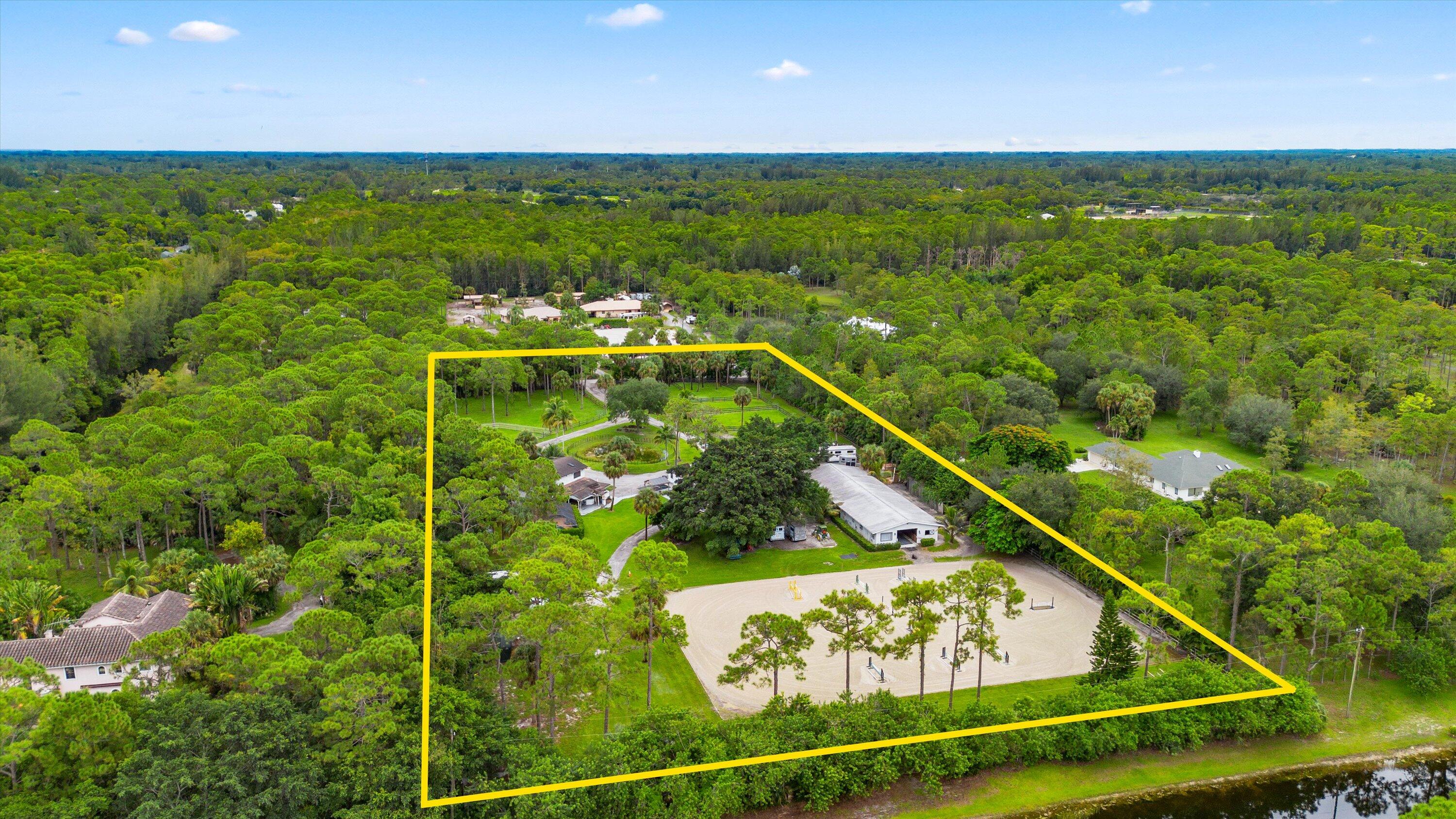Fabulous 5-acre equestrian property. Including a 4-bedroom home with 3 bathrooms plus 1 bed & 1 bath outside home, 16 stalls, 10 paddocks, and large GGT arena located in the highly desirable gated community of Deer Run! This turn-key property is made by a Five Star Builder whom designed a newer 12-stall center-aisle barn with: tack room, laundry/feed room, new office/lounge with a full bathroom. The barn amenities are complete with air-conditioning. The 130x200 All Weather arena features premium GGT footing and instant drainage for riding rain or shine. The arena and all 10 paddocks are fully irrigated. The back of the property has an additional 4-stall shed-row style barn with an oversized foaling stall... The charming and unique two-story farmhouse features 4 bedrooms, 3 full bathrooms. The main level offers 2 bedrooms, a full bath, laundry room/pantry, farmhouse style kitchen, an open concept living area and formal dining room. Upstairs features a loft and 2 master suites each complete with their own bathrooms and picturesque views of the property. The outside living area boasts a fully screened, in-ground, heated pool and hot tub, as well as an expansive covered deck and bar area overlooking the park-like setting. This unique one of a kind equestrian property won't last long!