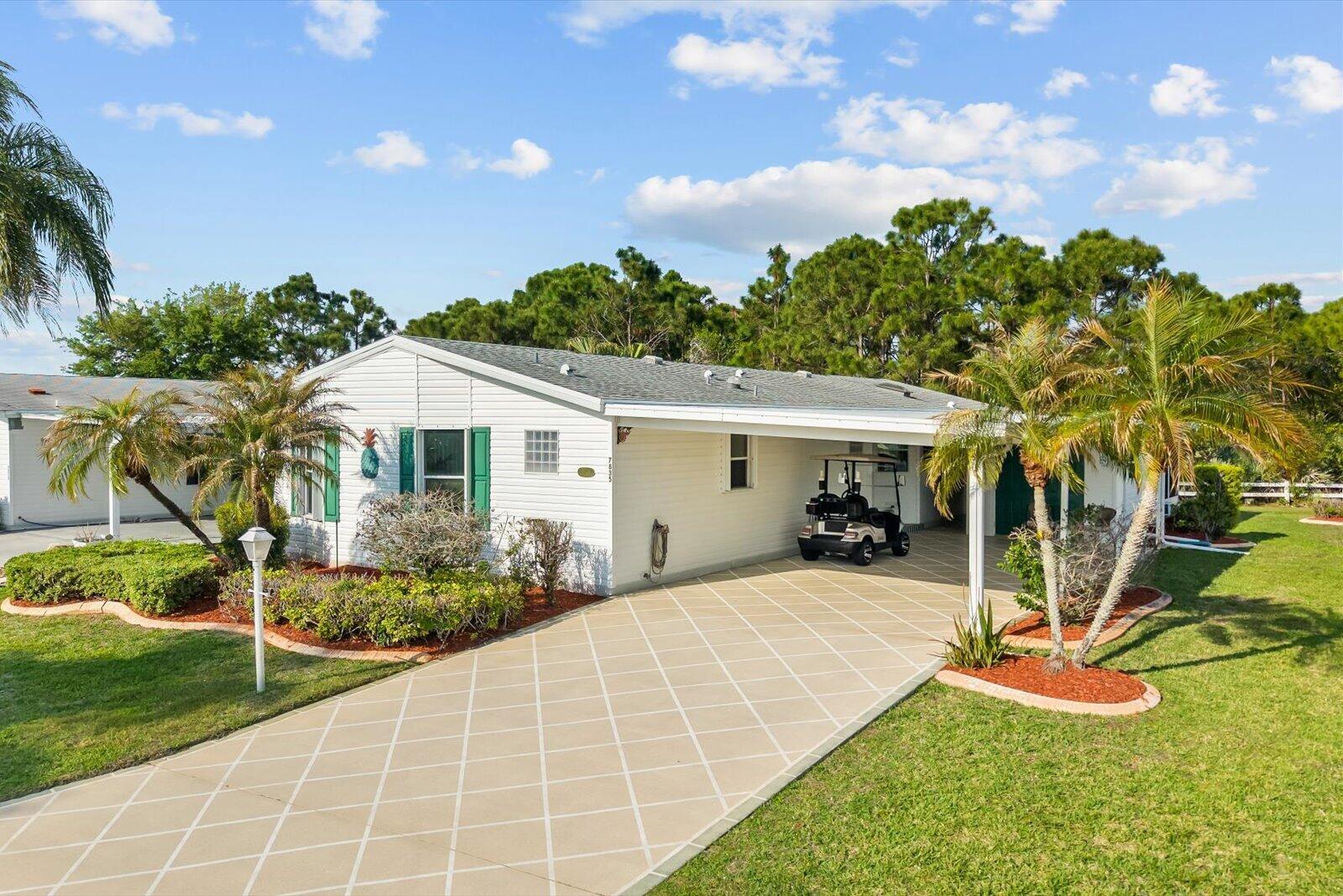 Enjoy peaceful preserve views from this beautifully maintained Islander III model in the desirable Savanna Club 55+ community. This home features laminate and tile  flooring throughout, an open island kitchen perfect for entertaining, and two spacious bedrooms with two full baths plus a versatile den—ideal as an office or third bedroom. Relax in the enclosed lanai or take advantage of the oversized driveway and cost-saving irrigation well. Additional highlights include accordion shutters, a 2018 roof, updated A/C, and fully furnished turnkey convenience. Move right in and start enjoying the Florida lifestyle! Golf Cart negotiable. Exclusions apply- list available.