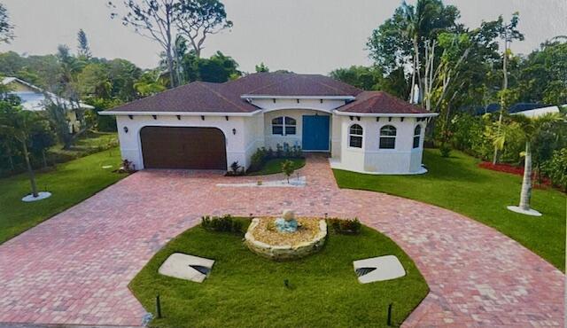 Built in 2024. This Superb custom home located in the desirable Hideaway Isles Community in Palm City with no HOA. Open  concept floor plan .Features include Full Impact windows & doors, Solid Wood Plantation shutters, Premium upgraded Kitchen with LEVEL 4 cabinetry & Custom installed French Farm door pantry. Also includes dual air purification & UV HVAC With SMART a/c system. Garage & back Patio have been sealed with epoxy flooring. Circular paver driveway for easy access. Outside home landscaping comes with Floratam grass and deep well water sprinkler system. Too many upgrades to describe, a must see dream home. Just minutes from Downtown Stuart & quick access to Florida turnpike.