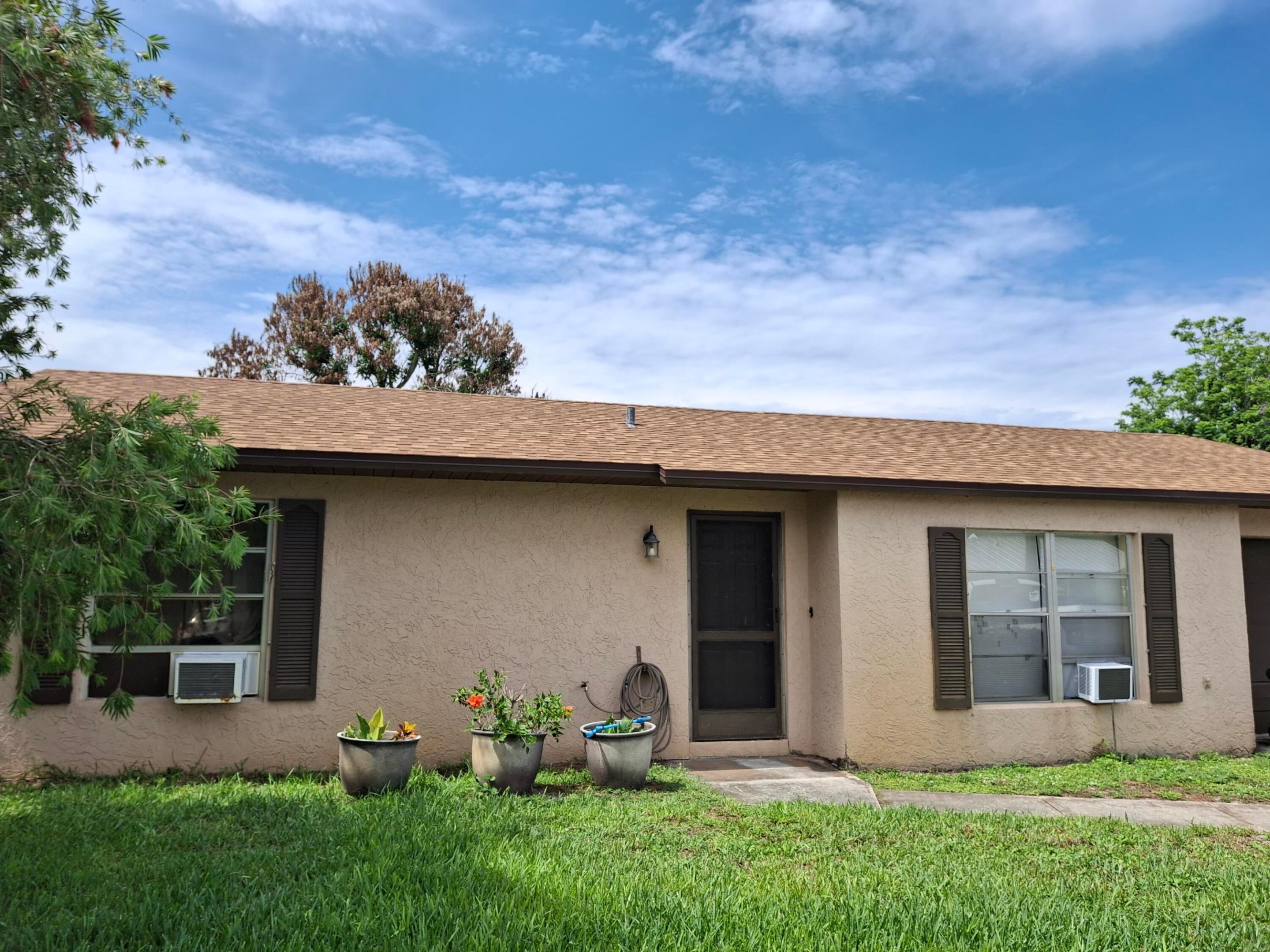 New roof from 2025. Handyman special with great value only 2 min from the turnpike. Welcome to this charming single-story residence in Port St. Lucie. This  offering 978 square feet of thoughtfully designed living space. This two-bedroom, two-bathroom home provides comfortable accommodations with a one-car garage for convenient vehicle storage. The efficient layout makes this property an excellent choice for those seeking a practical and manageable residence in Port St. Lucie, FL. Whether you're looking for an entry-level investment or a downsized living option, this single-family residence delivers solid value and functionality.