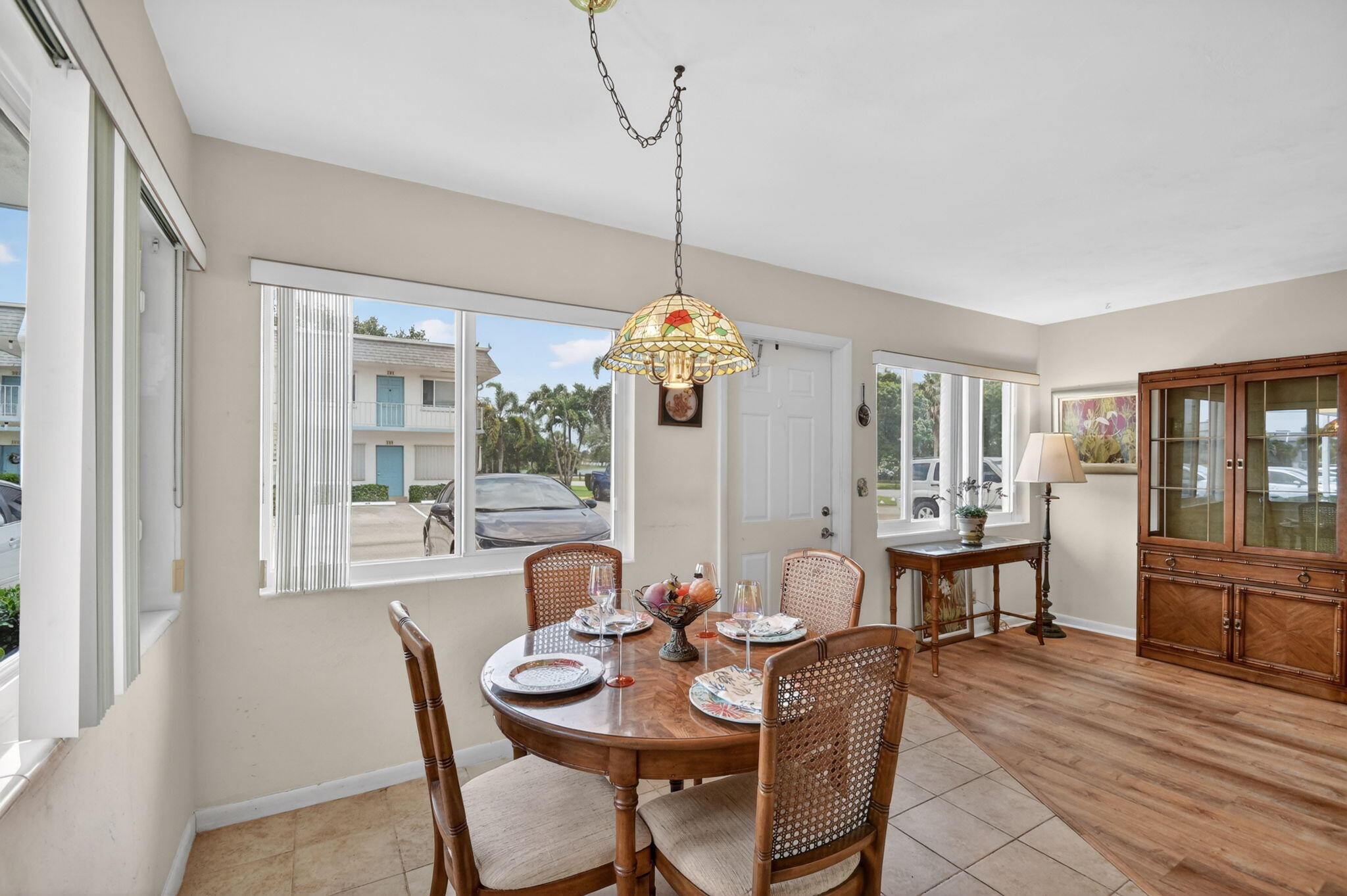 Priced to sell UNDER market value of $100,500. You will LOVE this location in central Palm Beach County. 3.5 miles to beach. Coveted King size 1 bedrm unit on 1st flr next to lake! New impact windows, New AC (Dec 2025), Upgraded bathroom w/walk-in shower, Hi-end luxury vinyl wood flooring, Vintage Florida bamboo furniture throughout. Across from 750-acre John Prince park w/350-acre Lake Osborne, biking trails, golf driving range, etc. 1 minute to Tri-Rail station. 2 min to 95. Only 5 min to cute dwntwn Lake Worth Beach. 8 min to beach/ocean. 15 min to both dwntwn WPB & Delray Bch w/ their many restaurants & shopping. Just feet from recreation bldg w/pool, gyms, pickleball/shuffleboard/bocce ball courts, billiards table/ping pong rooms, library, BBQ area, mgmt. office, etc.  Well maintained (physically and financially) 55+ community. No pets. Credit score of 700+ needed to buy here.