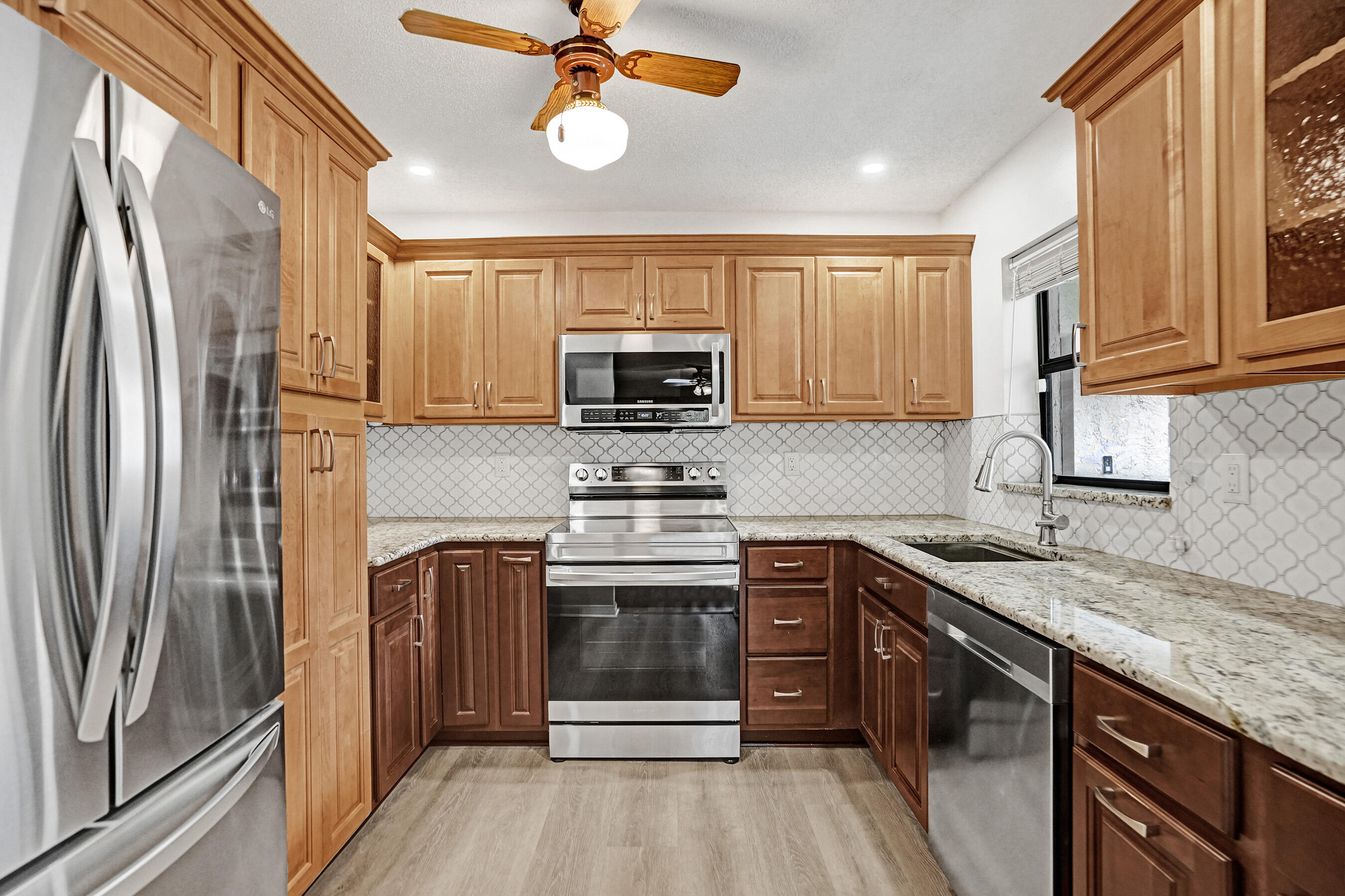 Fannie Mae approved. Buy with as little as 5%! Stunning waterfront 2-bedroom, 2-bath condo located on the second floor with serene water and park views from every room. The updated kitchen features premium cabinetry with built-ins like a spice rack, pantry, pull-outs, and soft-close drawers, along with high-end SS appliances. Enjoy peace of mind with a newer A/C (22'), impact sliding doors, and a brand-new in-unit washer and dryer. Relax on the screened patio and take in the scenic surroundings. Includes assigned parking, ample guest spaces, and is pet friendly. Baywood Village offers a pool plus access to Township amenities including a gym, clubhouse, and more. Budget includes reserves.  Fannie Mae approved. Buy with as little as 5% down not based on budget. Can rent after the 1st year.