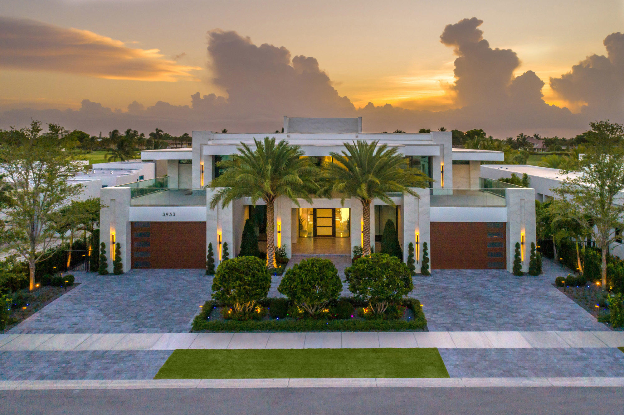 Truly marvelous custom built one of a kind modern masterpiece in the most Exclusive Gated Secure Community in Fort Lauderdale: The Enclave at Coral Ridge Country Club.    Incredible 14,871 sq feet total with approximately 9,000 sq feet under air | 8 Bedroom | 9 Bathroom |4 Car showroom garage | 3,178 of covered balconies | Be inspired nightly by Spectacular sunsets on this Trent Jones golf course.  Breathtaking modern design home sits on over 18,000 sq. Ft. Lot.  Majestic imperial staircase wows the most sophisticated as soon as you arrive.  Be blown away by the attention to detail and design throughout the entire home, custom built ins, fireplaces, .   Relax or entertain in your gourmet chef kitchen with tons of natural light and wide but private golf views. Relax in your huge resort style pool with water and fire features and custom glass tile sun-shell.  Never has it been easier to have top tier quality and custom design in one magnificent home.
