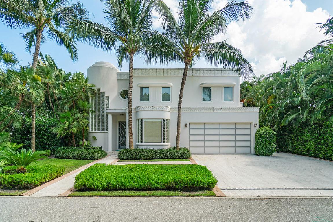 An art deco jewel box, built in 2013 with rare private beach access. This outstanding residence, honored with the Schuler Award for architectural excellence, integrates solar panels, impact glass, and locally sourced materials. Nestled on the sought-after North End of Palm Beach, just two homes from the ocean with beach access, it epitomizes indoor-outdoor living. The home offers three ensuite bedrooms plus a flexible fourth bedroom, den, or yoga studio, along with a great room, open chef's kitchen, covered patio, and upper balconies. Southern exposure enhances the heated pool with swim jets, spa, and summer kitchen. Terrazzo and wood floors, ample closets, sound system & two car garage.