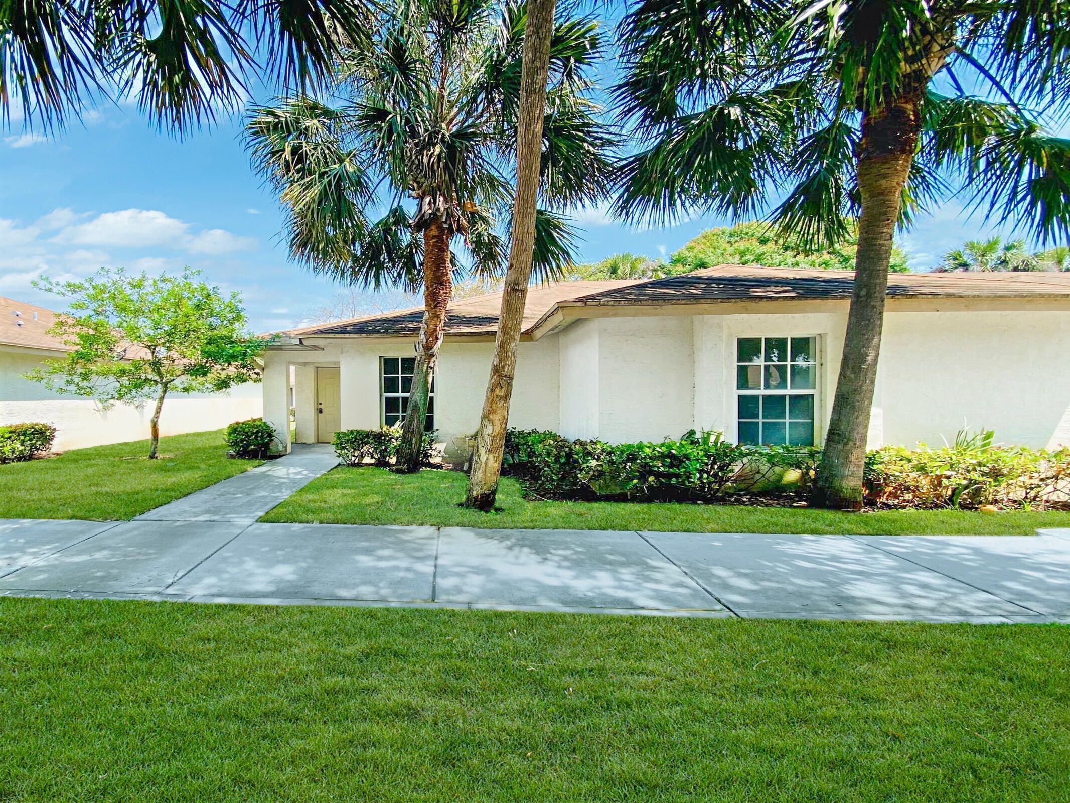 Welcome to this thoughtfully designed villa in Palm Villas, offering three bedrooms and two full bathrooms within 1,401 square feet of finished living space on a single floor. This one-story layout provides convenient, accessible living with all rooms situated on the same level, eliminating the need to navigate stairs. The villa's functional floor plan accommodates diverse living needs while maintaining an efficient use of space.  Villa with modern kitchen, newer appliances, washer/dryer, big open floor plan with sliding glass doors to your covered fenced back yard with view of mature lush landscaping.
