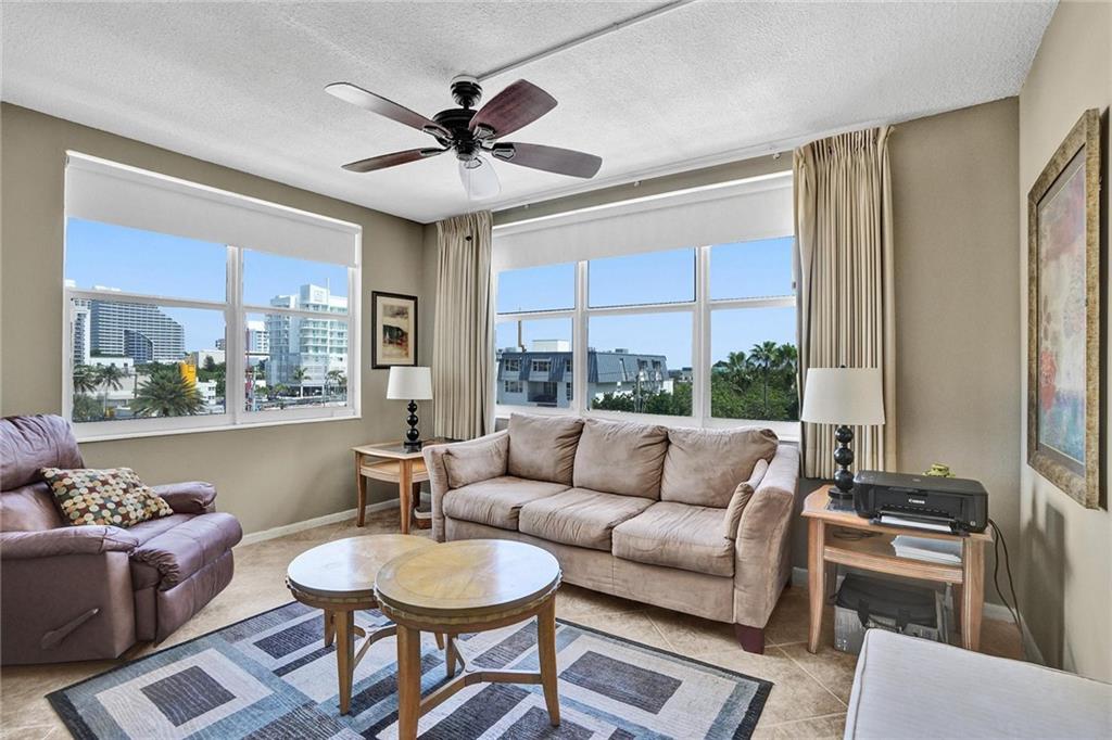 Hidden OASIS Directly on Intracoastal in Central Beach!  RARELY AVAILABLE turn key end unit 1 bedroom 1 bath  condo with additional "Florida room"  in boutique building with gorgeous view.  Perfect FLEXIBLE RENTAL POLICY lets you rent out 12 times per year so that you can enjoy a high rate of return when not living there. can be homesteaded! Low Low condo fees of $300 per month includes parking!Quiet Coveted central beach location ideally situated on the 5th floor looking out towards the water, close to stores and shops, this condo is less than a 4 minute walk to the ocean's edge and EZ access to the beach which is just steps away. Enjoy the  Gorgeous heated pool and picturesque sundeck directly on the intracoastal for outside entertaining and grilling.