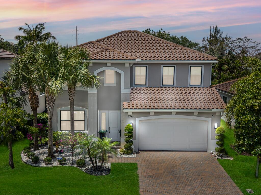 Step into elevated living in this beautifully upgraded Lake Worth home, where comfort, style, and functionality come together effortlessly. The backyard is designed for true Florida living, featuring a stunning saltwater pool with a travertine paver deck perfect for relaxing afternoons or entertaining guests. Inside, you'll find a clean, modern porcelain tile and luxury vinyl plank flooring throughout, offering a carpet free lifestyle. A custom wine cellar with glass and accessed through a sleek glass door adds a refined touch, while the electric fireplace creates a warm and inviting atmosphere. The layout is both practical and versatile, featuring a convenient guest bedroom on the first floor, ideal for visitors or multi-generational living.  The fully renovated primary bathroom feels like a private spa, complete with a freestanding soaking tub, smart LED mirrors, a multi-function shower system, and a built-in TV for the ultimate unwind experience.  Additional highlights include a newer exterior AC unit from 2024, a whole home water softener and filtration system, and thoughtful upgrades throughout that enhance both comfort and convenience.  This home offers the perfect blend of everyday luxury and relaxed Florida living, ideal for those who appreciate quality details and move in ready design.