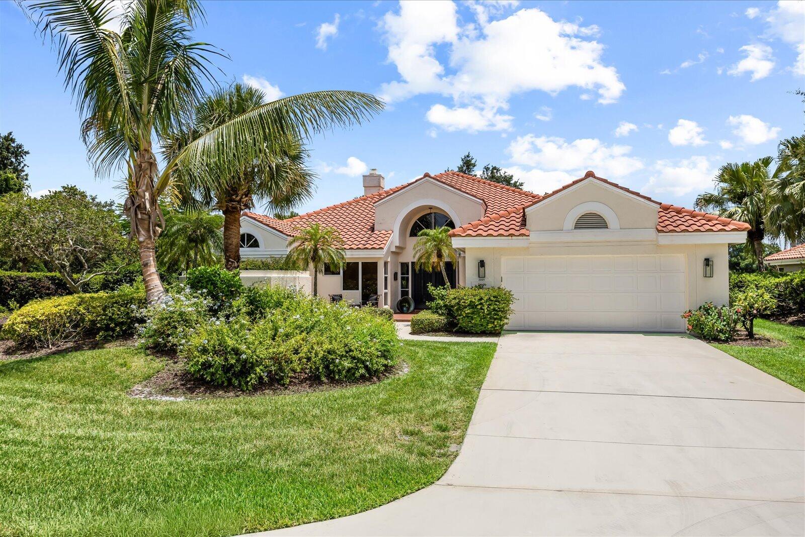 Luxury Living in Harbour Ridge Country Club! Renovated and move-in ready, this turnkey residence at 2001 NW Laurel Oak Lane offers privacy, elegance, and an exceptional lifestyle. Enjoy a lush, private backyard with distant golf course views in one of Palm City's premier guard-gated communities. Harbour Ridge features two championship private golf courses, tennis, pickleball, fitness center, spa, marina with boat service to downtown Stuart, casual and fine dining, lap and family pools, dog park, and an active social calendar. Resort-style living awaits in this beautifully updated home where every day feels like a vacation.