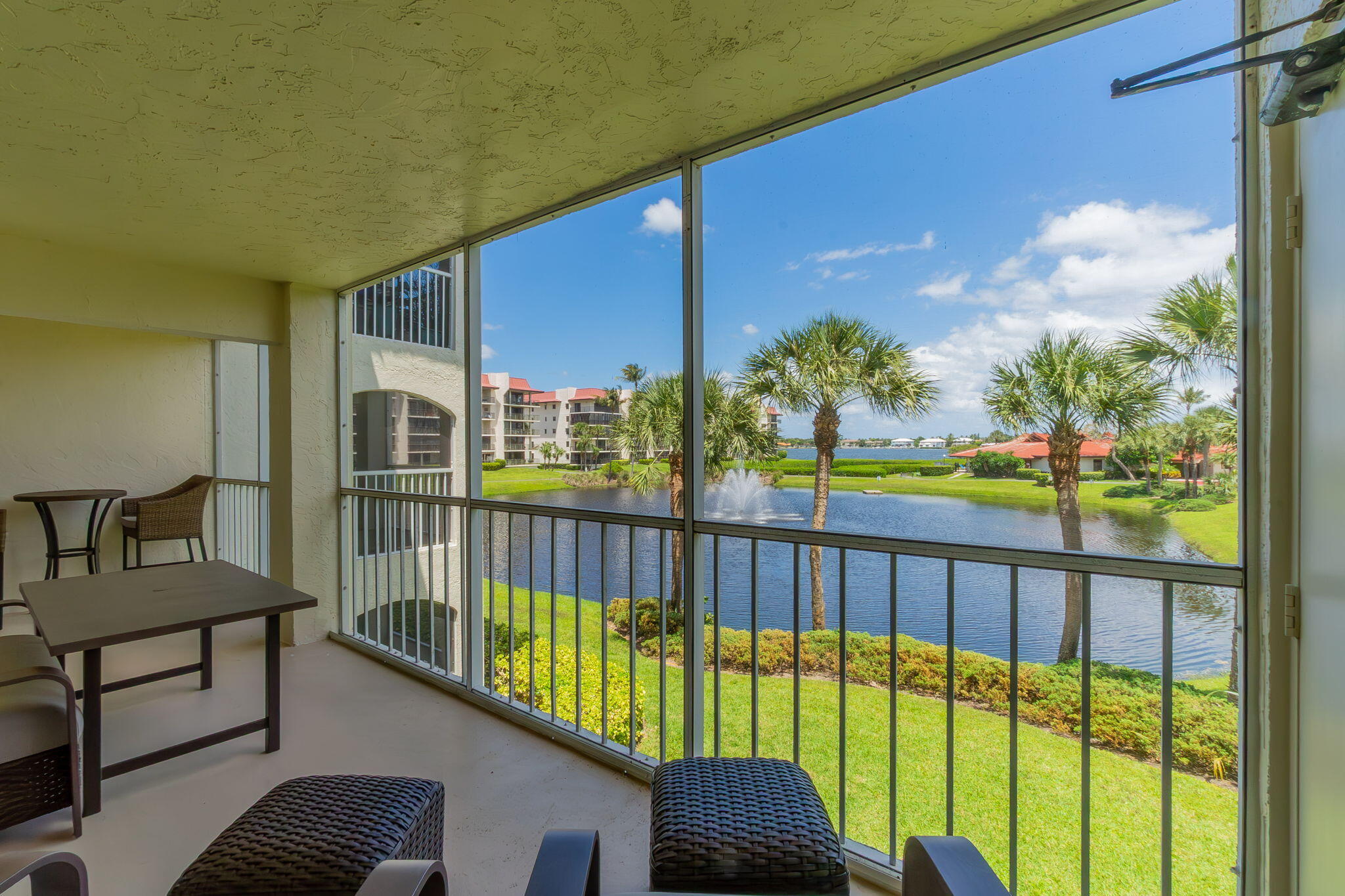 Wonderful 2/2 second-floor condo with a spacious living area and private balcony offering tranquil pond views stretching to the Intracoastal Waterway. Open and inviting layout, perfect for relaxing or entertaining. Community amenities include two pools, hot tub, large sundeck, and active clubhouse. Unique highlight: private beach access for residents. Enjoy scenic walking  throughout the community, plus pickleball and tennis courts for an active lifestyle. No elevators. New Air conditioner. Ideal for year-round living or a seasonal retreat!