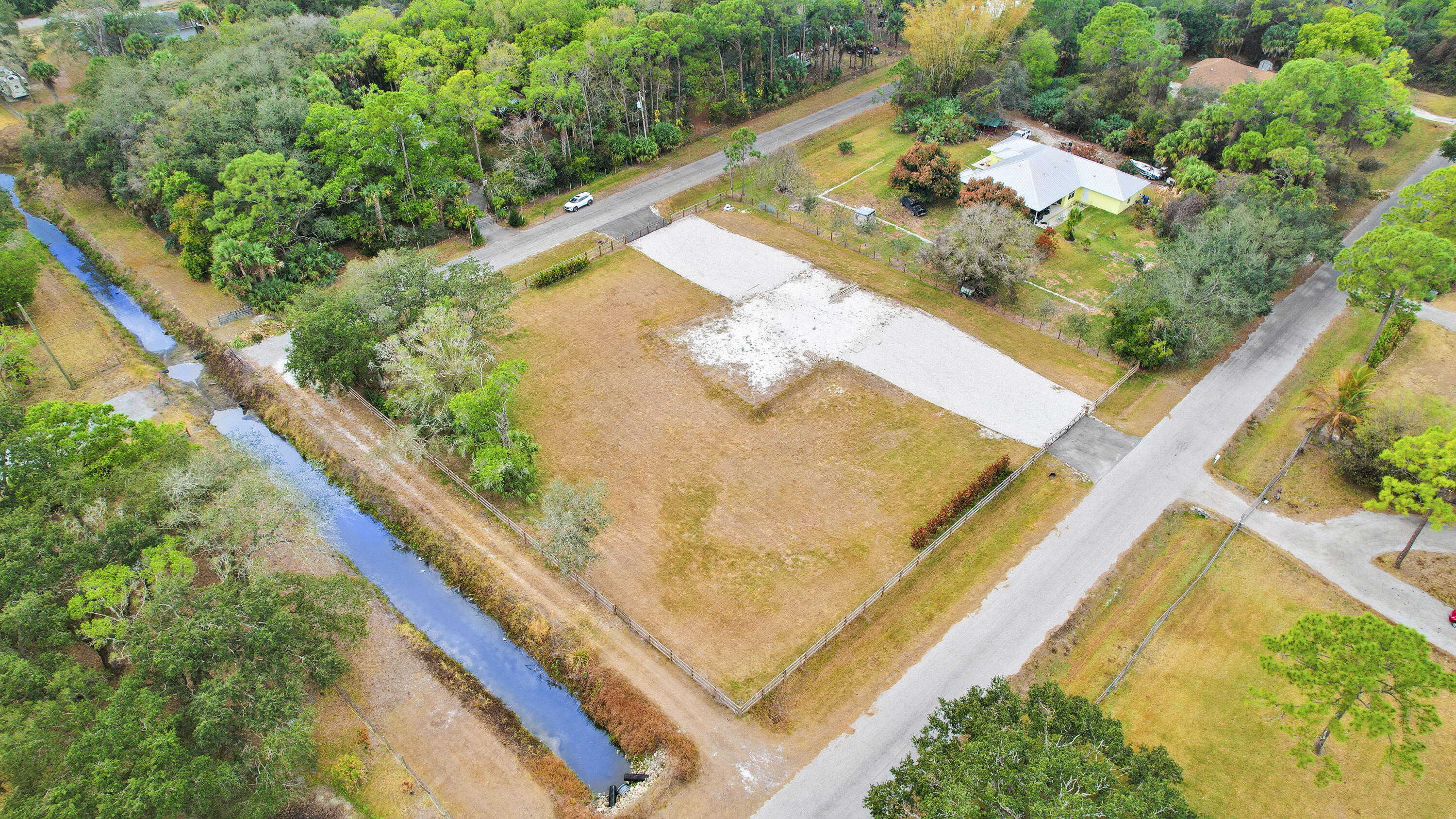 THE ACREAGE - Land