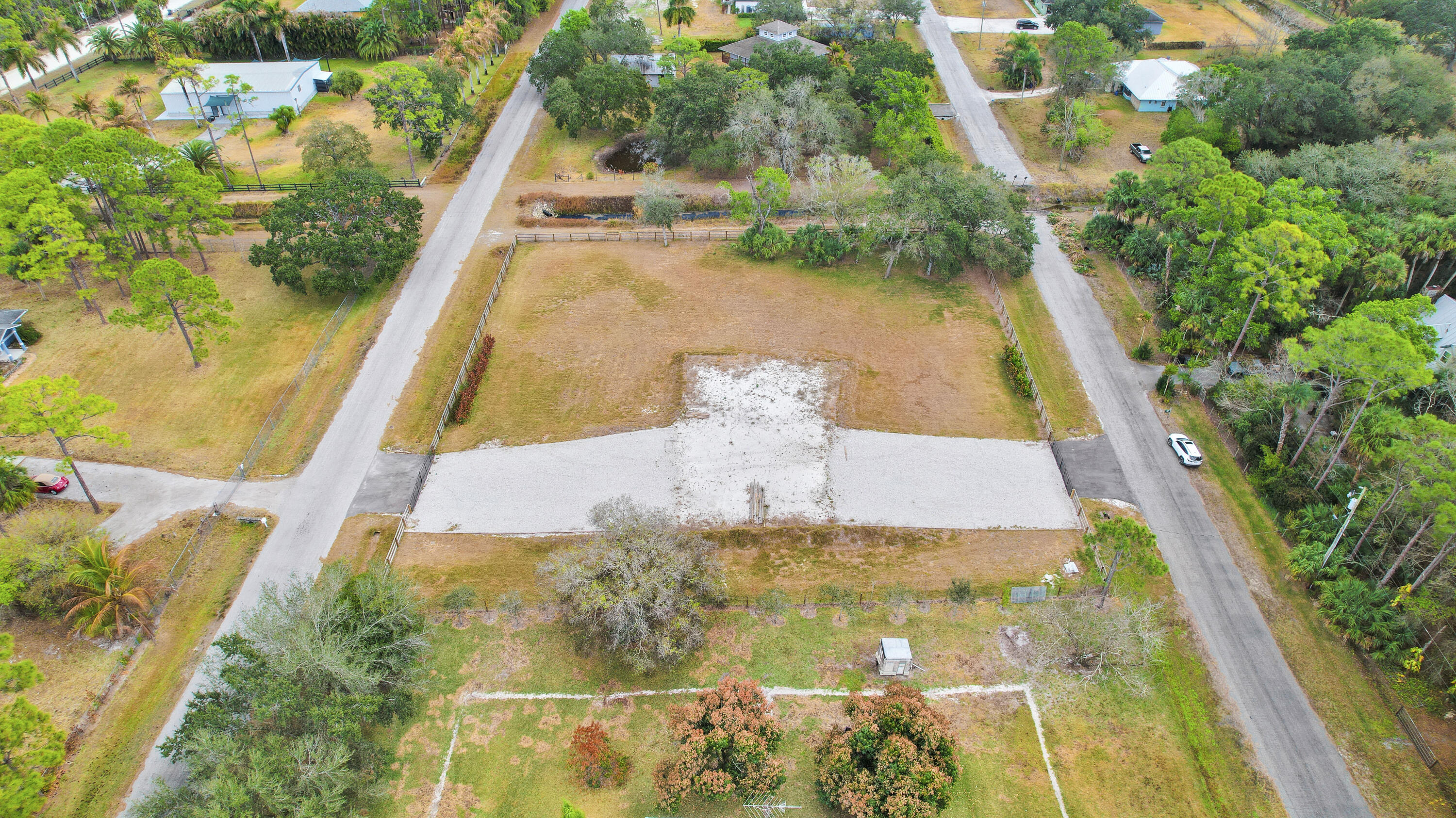 THE ACREAGE - Land