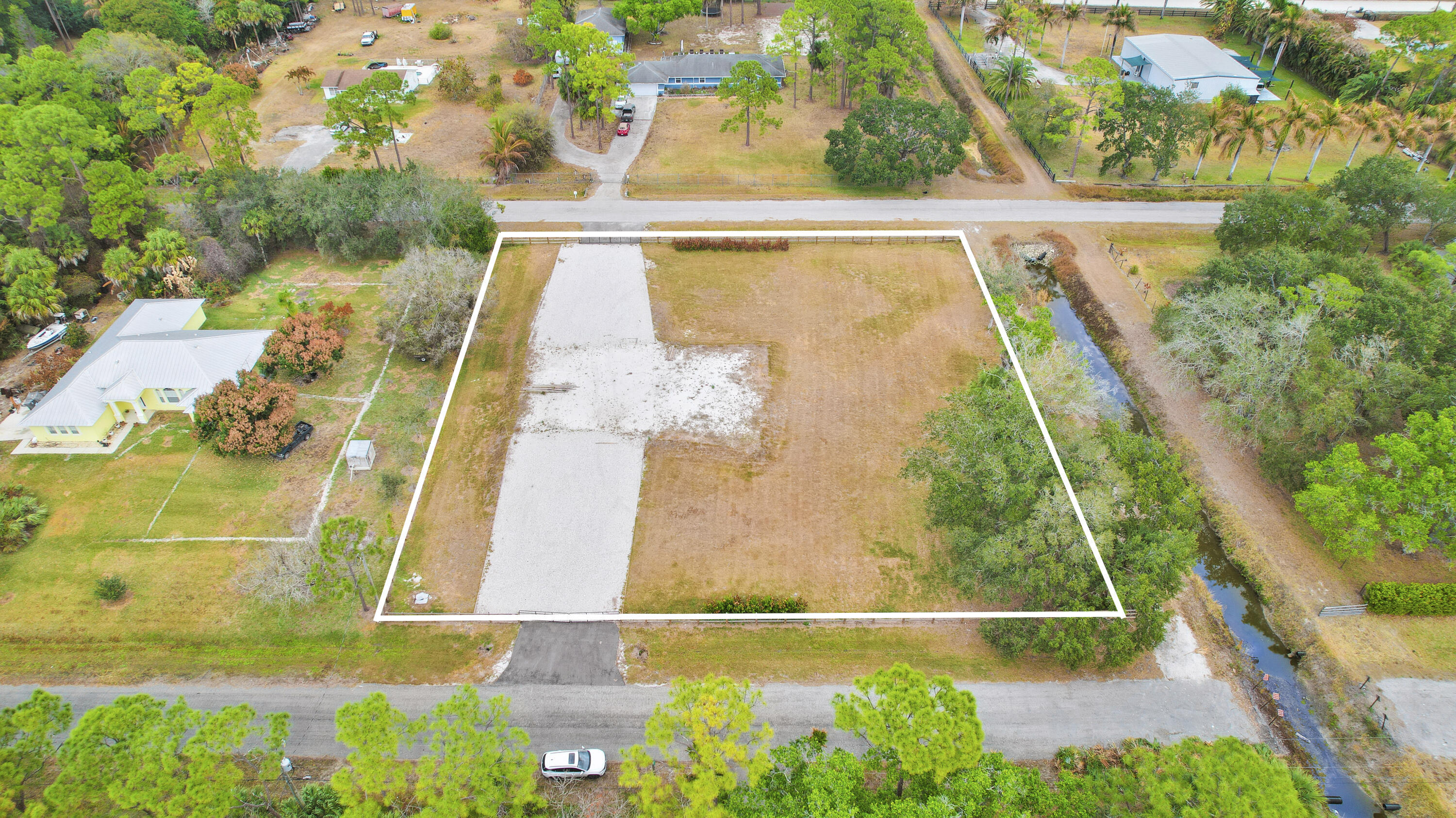 THE ACREAGE - Land