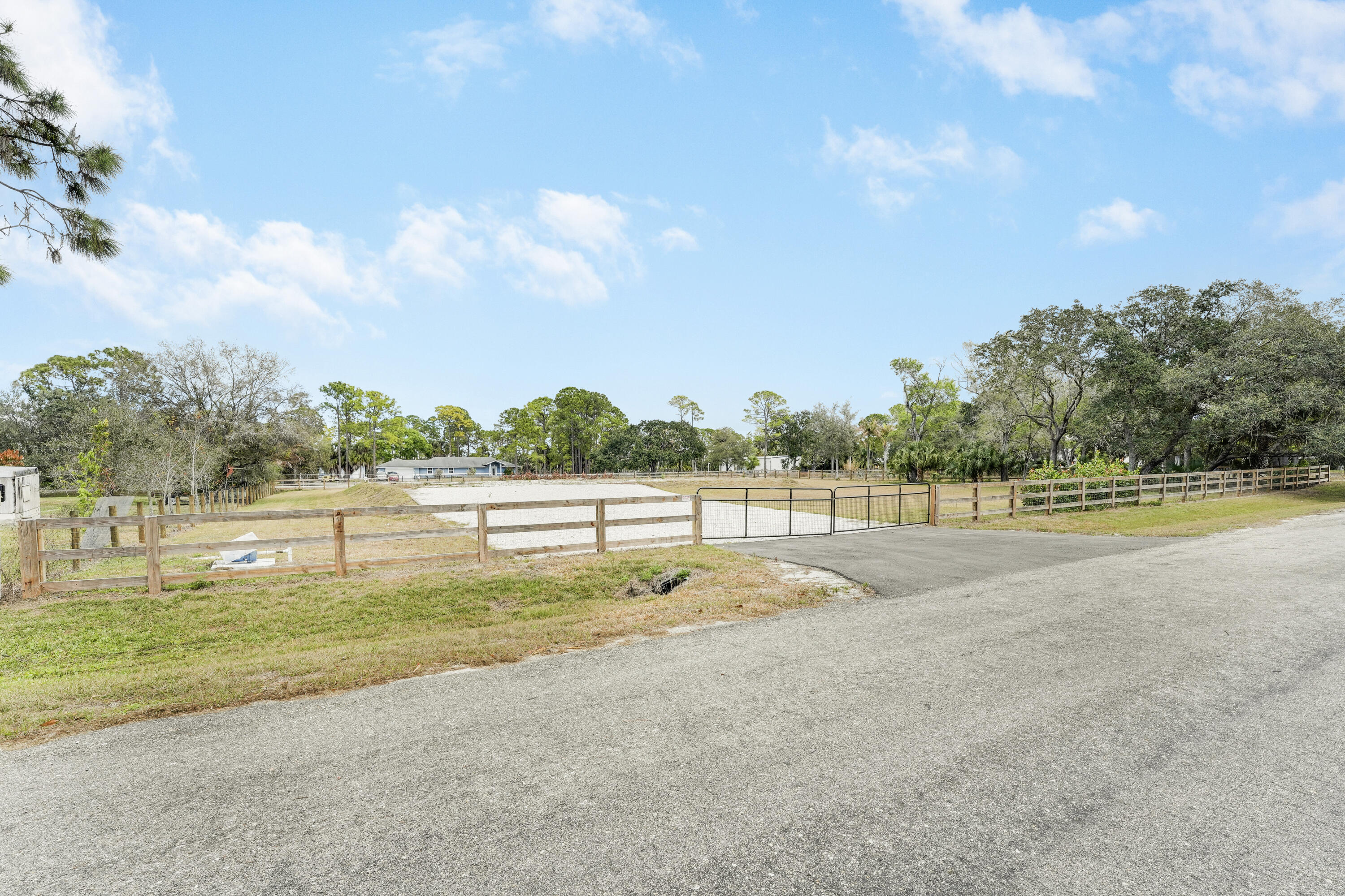 THE ACREAGE - Land