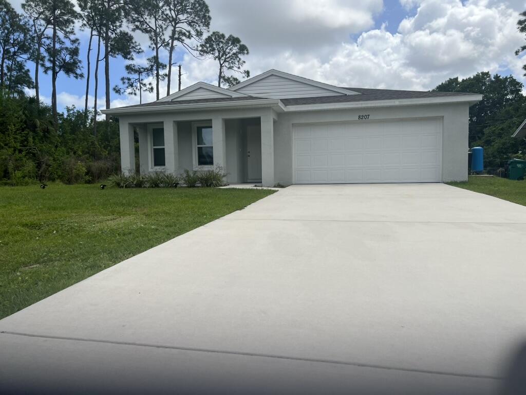 Welcome to this beautifully updated newer construction home located in a quiet, growing area of Fort Pierce. This modern residence features an open-concept layout with a spacious kitchen, complete with granite countertops, stainless steel appliances, and ample cabinet space—perfect for both everyday living and entertaining. Enjoy a bright and airy living area, comfortable bedrooms, and well-appointed bathrooms designed with a clean, contemporary finish. The home also includes a large driveway, attached garage, and a private yard ideal for relaxing or hosting. Conveniently located near shopping, dining, schools, and just a short drive to the beach and I-95 for easy commuting.  Features: • Newer construction • Granite countertops & stainless steel appliances • Open-concept floor plan • Tile