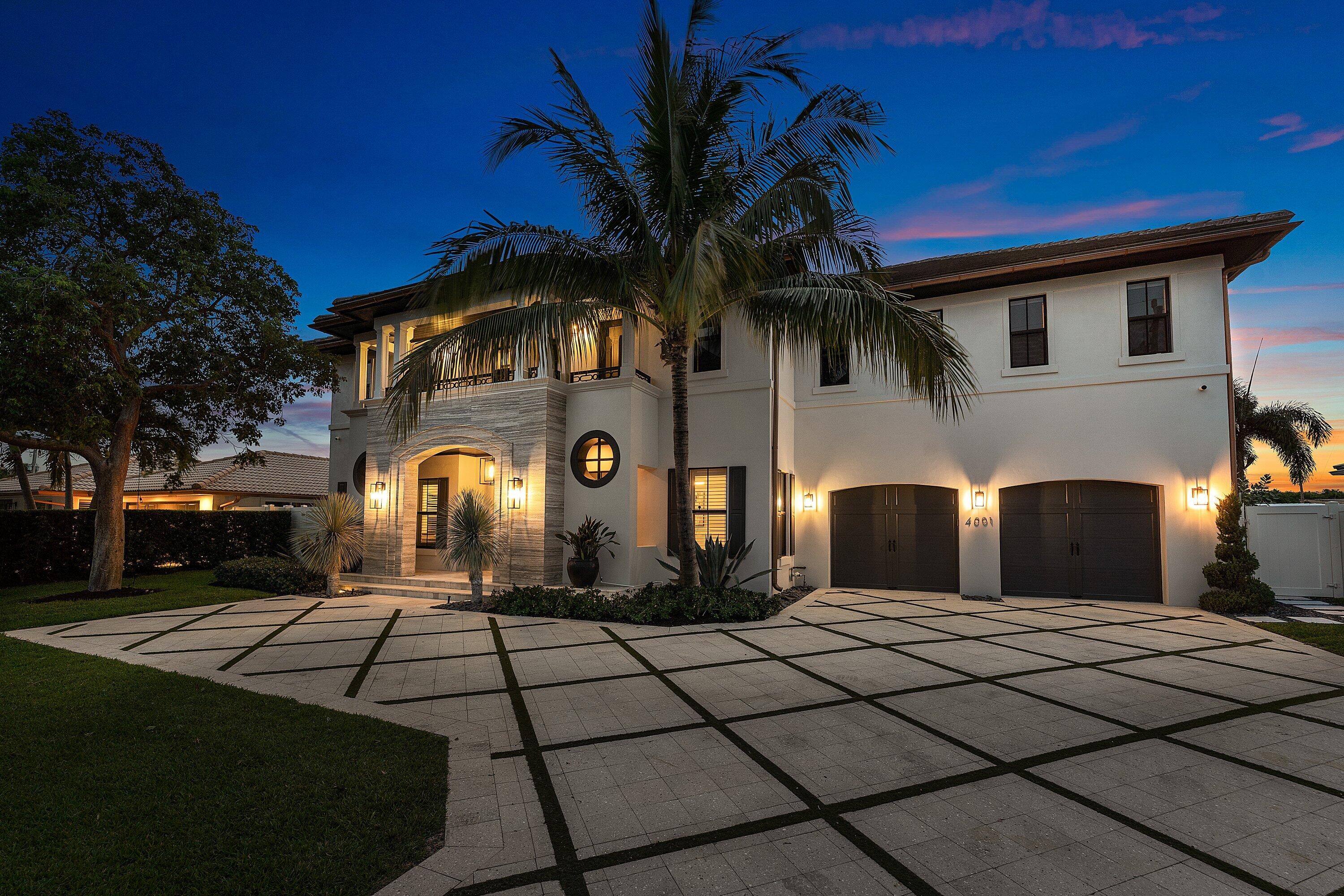 Experience luxury waterfront living in prestigious Lighthouse Point in this exceptional custom residence built in 2018 by renowned builder Scott Mire! Meticulously maintained, this exceptional 5 bed & 4 bath residence plus an office showcases sophisticated designer finishes, custom wallpaper, soaring ceilings, abundant natural light, and seamless indoor-outdoor living. The spectacular backyard was redesigned in 2024 and features a resort-style pool, new dock and 30,000-pound boat lift, and deep-water dockage with direct ocean access and no fixed bridges. A newly installed whole-house generator provides added peace of mind. Ideally located in prestigious Lighthouse Point near the Hillsboro Inlet, beaches, dining, and shopping. Designer furnishings are negotiable.