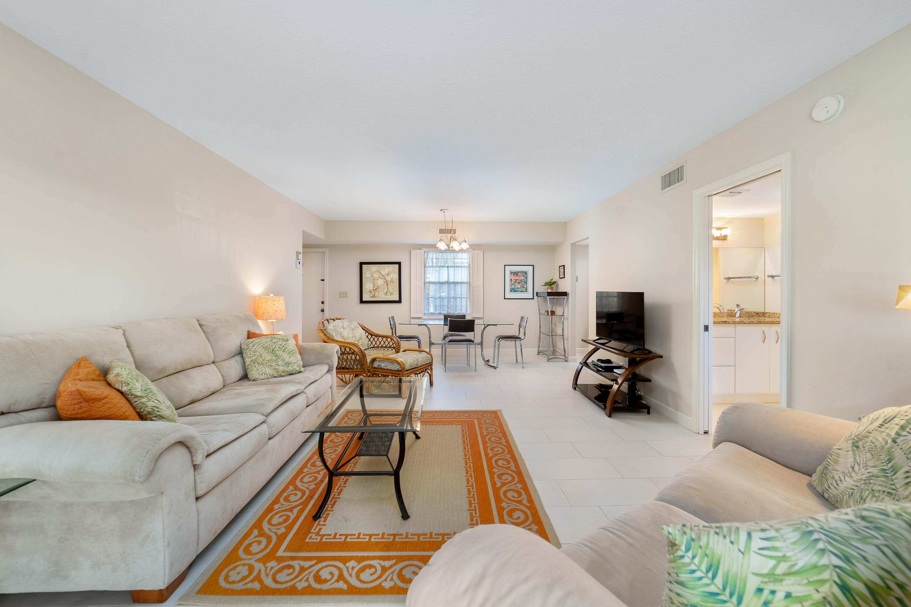 Welcome to Sugar Sands, a friendly island community offering a relaxed coastal lifestyle. This light-filled 2-bedroom, 2-bath condo is ideally situated near the marina and canal, perfect for enjoying gentle breezes and tranquil views. The split-bedroom layout offers comfort and privacy, while the dome-style kitchen features generous storage and functionality. The spacious living area creates an inviting spot to unwind. Enjoy access to resort-style amenities including a beautiful heated pool, clubhouse, tennis courts and community marina. Additional conveniences include an elevator, extra storage, and common laundry. With its great location and peaceful surroundings, this condo offers the best of island living.