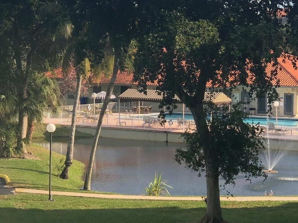 Great investment opportunity in an all-ages community with no rental restrictions. Currently leased at $1695.00 till 11/30/2026. Spacious unit with 2 bedrooms and 2 full baths, laminate and tile floors, large, screened patio. Elevator building, pool, and clubhouse in a gated community. Investors, international buyers and corporations are welcome.