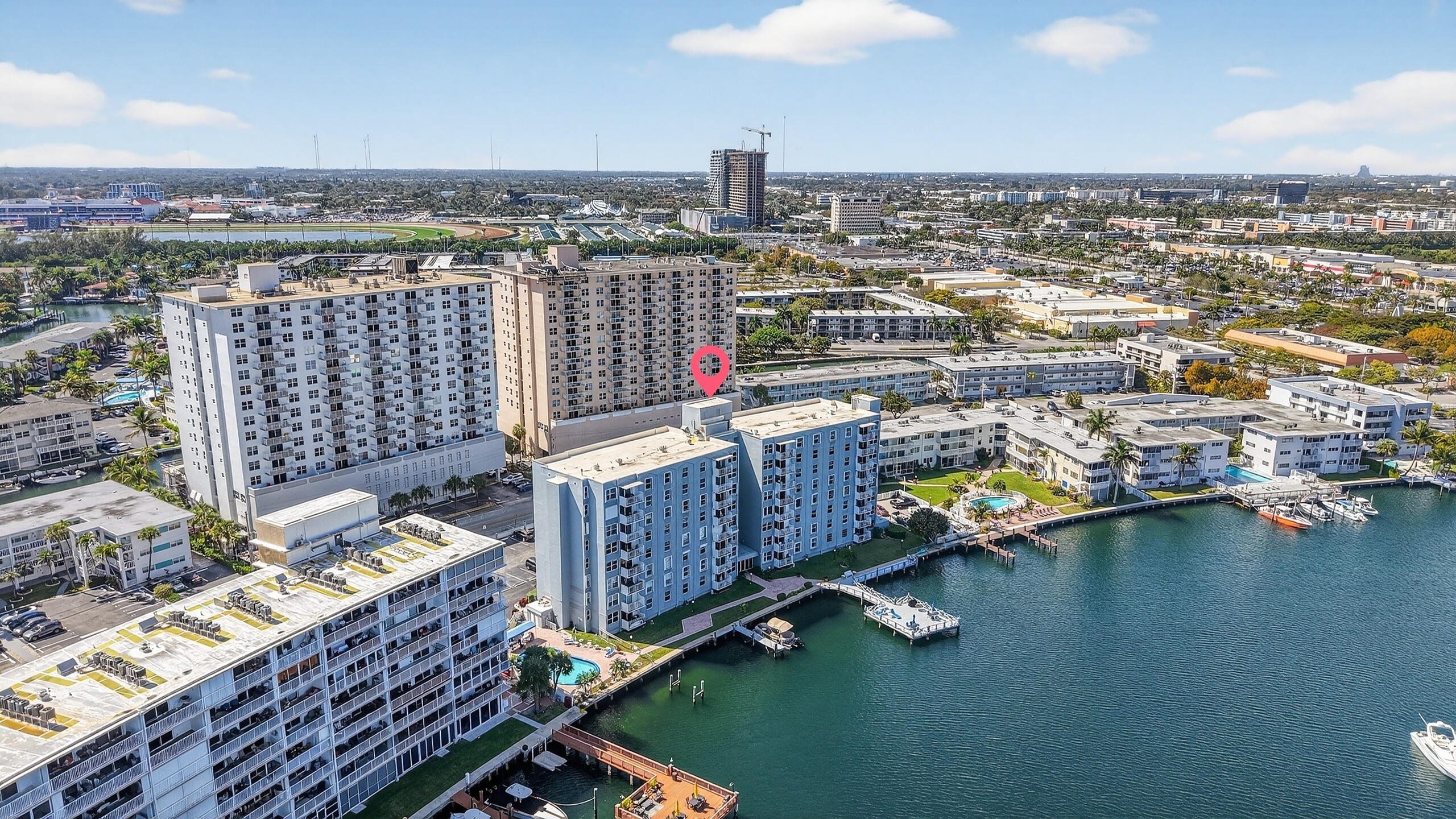 Imagine arriving home to your sun-filled 3rd-floor corner residence at Golden Isles Yacht Club, where light wraps every room in calm, clarity, and effortless ease. The open flow naturally draws you in—walk-in closets, dedicated office space, and a kitchen designed for connection with granite countertops and an expanded breakfast bar. Step outside and feel your lifestyle elevate... heated pool, lush waterfront grounds, and direct Golden Isles water access with potential dockage up to 25', creating seamless days on the water and unforgettable sunset moments. Investor-friendly with a tenant in place. Newer A/C, water heater, and impact windows/doors. Less than a mile to Hallandale Beach, dining, shopping, and entertainment. Now pause... and imagine life here.