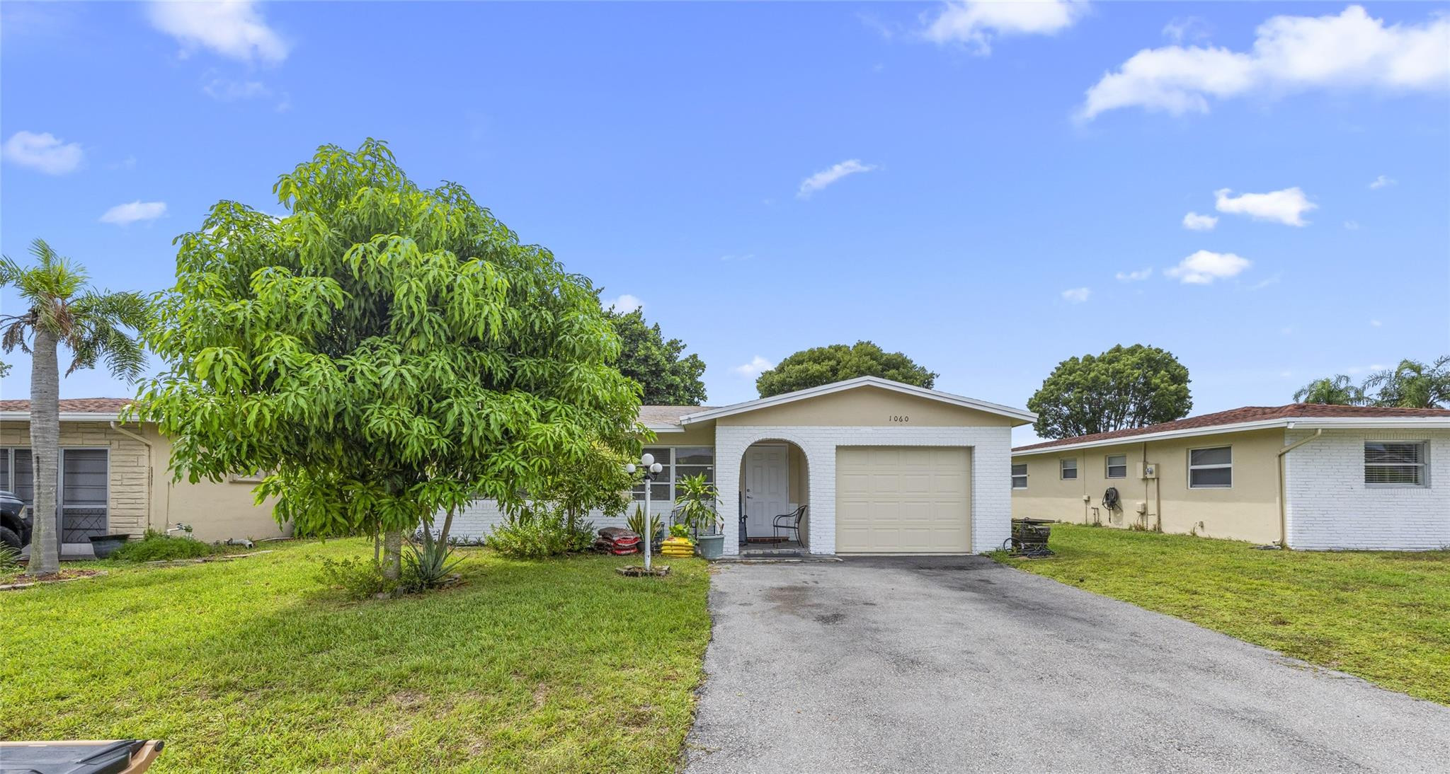 Back on Market! Discover the perfect blend of comfort and convenience in this  fully renovated home, ideally situated between I-95, the Turnpike, and Sawgrass Expressway. Roof, AC, and water heater are all less than 5 years old. Inside, you'll find a charming 3-bedroom, 2-bath with a large kitchen area complete with stainless steel appliances and quartz countertop. The layout features elegant tile and wood laminate flooring and plenty of windows. Enjoy a well-rounded active lifestyle with access to community amenities including a pool, clubhouse, gym, and more. One of the lowest HOA in the area. This home qualifies for Down Payment Assistance program with the preferred lender.