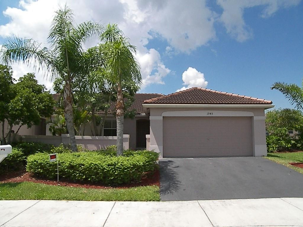 Welcome to the Hammocks at Savanna, a beautifully maintained gated community. This bright 2BD, 2BA corner villa with a 2 car garage sits on a quiet cul de sac-an ideal setting for families. The home features kitchen w/granite counters, stainless appliances. updated baths, new window treatments, new bedroom flooring, covered porch, ceiling fans, and full hurricane protection. The HOA covers lawn care, basic landscaping, exterior painting, and roof cleaning, making maintenance effortless. Residents enjoy access to Savanna's exceptional Amenities Center with three pools, water slides, tennis, pickleball, roller hockey, a fitness center, jacuzzi, and miniature golf.  Perfectly located near top rated schools, Weston Town Center, major highways (I 75 and I595), FLL airport, shopping, and dining. Easy to show