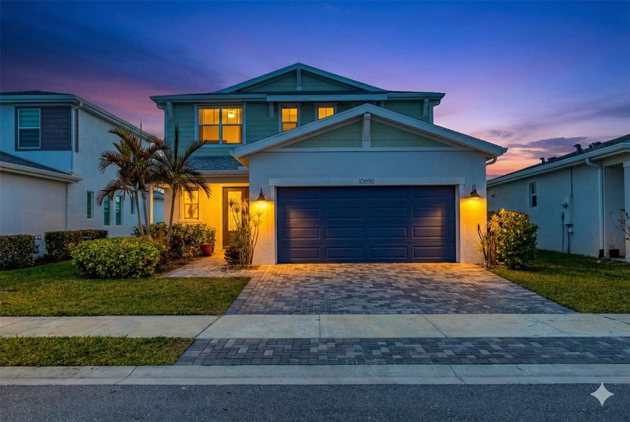 Property Leased Until June 2026 ...Stylish 4BR/3BA home on a waterfront lake lot (Lot 99) in gated **Emery at Tradition—loaded with builder upgrades and post-closing improvements! Enjoy a bright, open layout with volume ceilings, high windows/doors, and custom mixed flooring (floating wood-look in main areas + tile in baths), plus custom wood stairs. The gourmet kitchen shines with quartz countertops, stainless steel appliances, pendant lighting, and under/upper cabinet lighting. Convenient first-floor in-law suite with bedroom and full bath—perfect for guests or multi-gen living. Upstairs features a spacious owner’s suite with tray ceiling, LED lighting, and a generous walk-in closet, plus a secondary bath with double sinks....Please Do Not Disturb Occupants Additional upgrades include a custom walk-in shower with upgraded tile, professionally tinted first-floor windows/sliders for sun/heat mitigation, screened-in lanai, fully fenced yard, epoxy garage floor, fans + custom blinds in every room, and custom front landscaping. Step out back to peaceful lake views—yes, you can fish right from your backyard. HOA value is hard to beat: security system, cable, and internet included (Blue Stream), plus access to a private resident dog park, Central Park events, food trucks/markets, neighborhood shuttle, kids’ water play area, playgrounds, and trails.