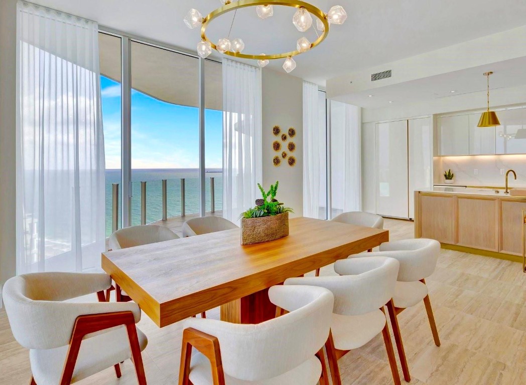 19th Floor stunning Four Seasons Corner Private Residence, with 3 balconies overlooking the ocean, intracoastal and skyline. 2 bedroom 2 bathroom plus power room with each bedroom with en-suite bath. private self parking or valet. balconies are very generous to enjoy outdoor living. Four Seasons offers in room dining, housekeeping available anf 24 hour room service. A stunning fitness center, spa also located in the building. This residence has beautiful furnishings and closets are built out ready for moving in. Private lobby entrance with residence concierge 24 hours.