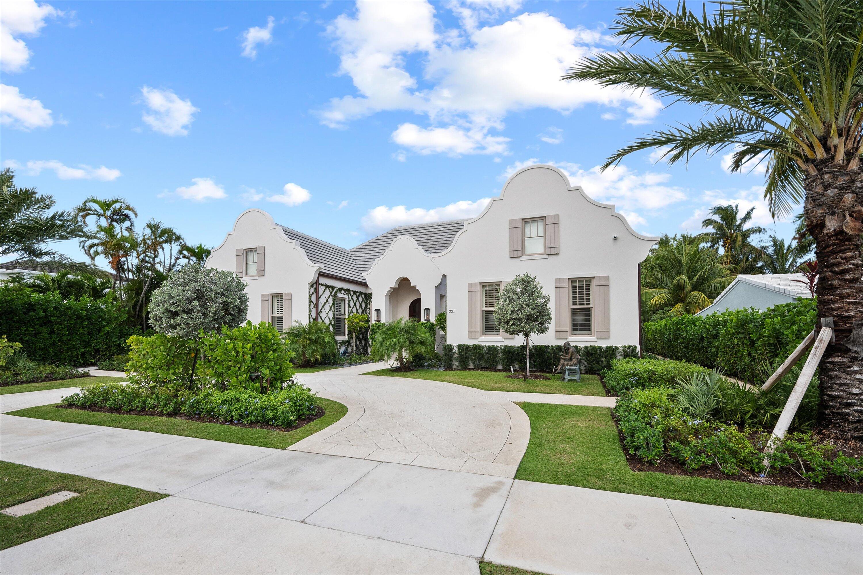 Stunning new construction that perfectly blends luxury and comfort. This impressive home features 5 spacious bedrooms and 5  beautifully appointed baths and two 1/2 baths, making it ideal for both family living and entertaining. Upon entering, you'll be greeted by elegant wood floors that flow throughout the home, complemented by soaring volume wood ceilings adorned with striking wood beams. The open kitchen, dining, and family room layout creates the most inviting, user friendly atmosphere.. Culinary enthusiasts will appreciate the chef's kitchen, which boasts an oversized walk-in pantry, top-of-the-line Wolf appliances, exquisite quartz countertops, and custom cabinets that provide both style and functionality. The primary suite is a true sanctuary featuring a spacious custom walk-in closet, a cozy coffee bar, and a luxurious bathroom complete with dual sinks, a marble shower, and a relaxing soaking tub. Step outside to discover your very own private retreat, complete with a sparkling swimming pool and spa, surrounded by a covered patio with retractable screens featuring a summer kitchen perfect for hosting gatherings or enjoying quiet evenings. In addition, the whole-house generator ensures you'll never be left in the dark. The desirable SoSo neighborhood is within minutes to fine dining, world famous Worth Ave shopping, and Palm Beach International Airport. Experience the perfect blend of elegance and modern living at 235 Summa...where your dream home awaits!