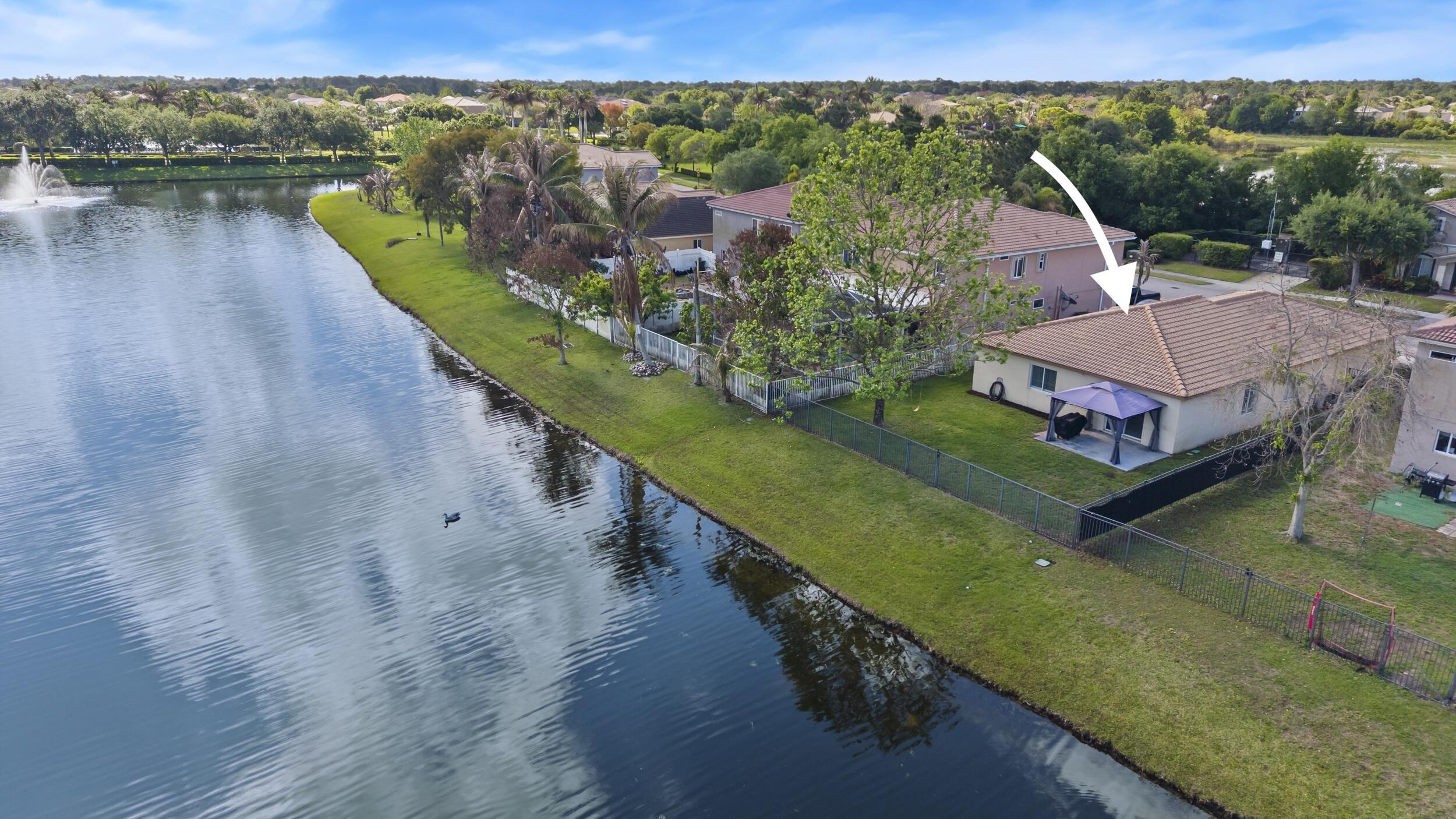 LAKESIDE Living at Its Best! Welcome to this beautifully maintained 4 bedroom, 2 bath home offering comfort, privacy, and scenic lakefront views. Nestled on a fully fenced lot, this property is perfect for enjoying outdoor living, pets, and added peace of mind. Inside, you'll find a spacious and functional layout ideal for both everyday living and entertaining. The home is equipped with a Halo whole house water filtration system, providing clean, purified water throughout. Wake up to tranquil lake views and unwind in your own private waterfront setting, all while enjoying the space and versatility this inviting home provides.