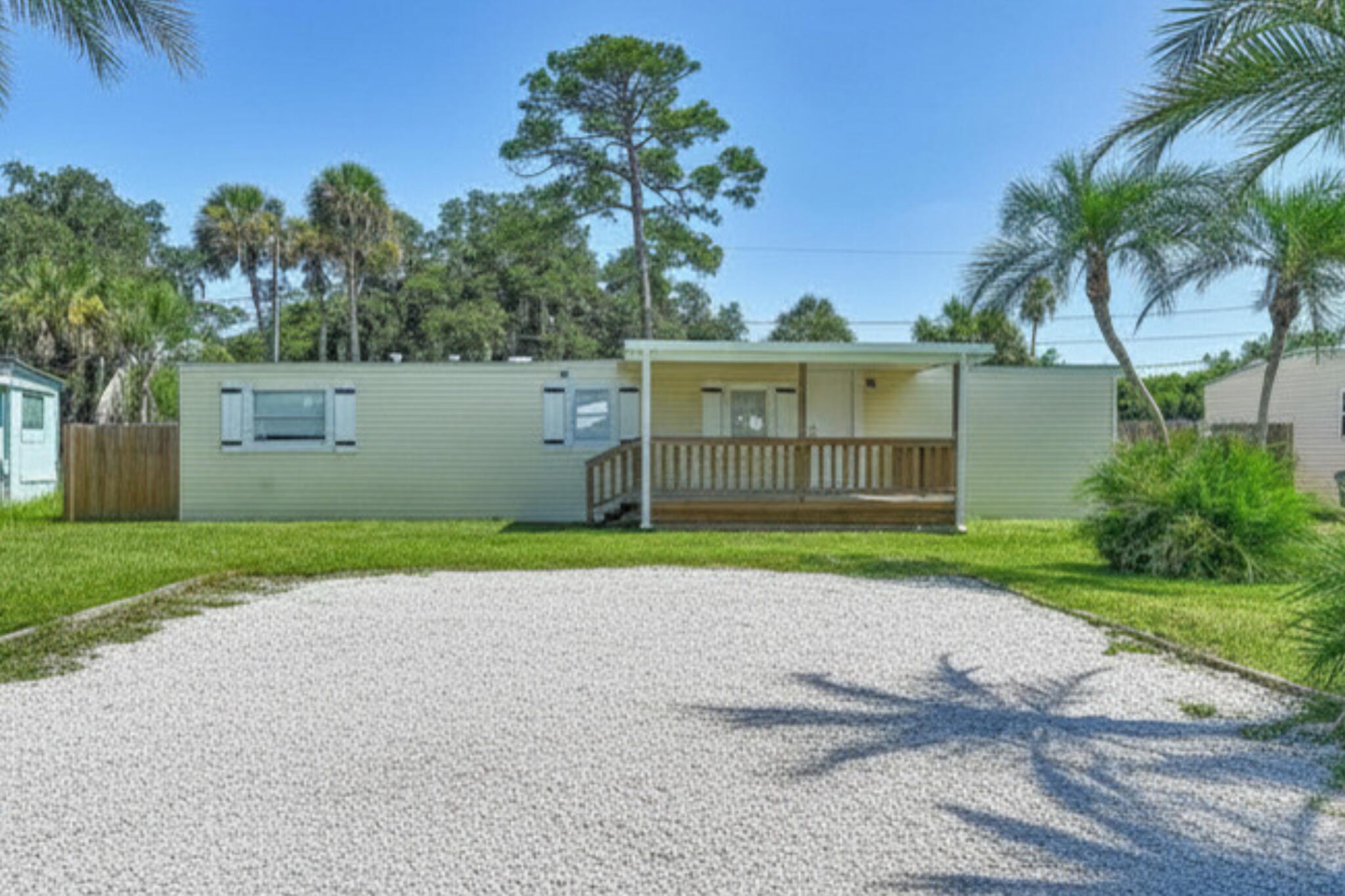 Great opportunity in the community of Green Acres, just west of Treasure Coast International Airport and minutes from the Indian River and Atlantic Ocean in Fort Pierce! This fully renovated 3-bedroom, 1-bath manufactured home was completed in 2025. It includes a great office/play room. Highlights include a metal roof, an energy-efficient modern kitchen with a large custom sink, top of line appliances and soft-close cabinetry. Durable Vinyl flooring throughout. A fenced in private back yard. Ample auto/boat/RV parking. Public water and sewer! Conveniently located near beaches, fishing, shopping, and all the attractions of the Treasure Coast offers! Would be great for a primary residence, vacation or investment property!