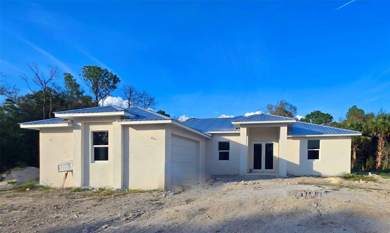 NCREDIBLE OPPORTUNITY TO BUY THIS NEW HOUSE IN Montura Ranch. This home is situated on BEAUTIFUL lot (1.25 acres), with the BEST of living in a rural setting. The GREAT ROOM floor plan features three BEDROOMS, 1 den and  two BATHROOMS, dining room. The master bedroom contains a spacious and modern bathroom, with doble Sink and Walking Closets. The design of this house is modern, with large impact windows that illuminate the spaces. Floors, cabinets, countertops, all contemporary. The spacious exterior is a perfect entertaining space for family and friends offering endless opportunities to create and have fun. NO HOA. HOME IS EXPECTED TO BE COMPLETED BY December