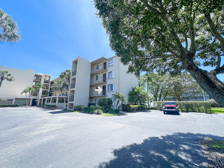 Beautiful opportunity for investors seeking immediate rental income! This fully furnished one-bedroom corner condominium is move-in or rent-ready from day one. The unit features a renovated kitchen and bathroom, along with a lovely water view overlooking the pool and canal.  Major updates include a newer air conditioning system (approximately 2 years old), as well as a washer and refrigerator of the same age, offering added value and peace of mind.  Located in a gated community in a highly convenient central location, this property is just a short walk to the beach, restaurants, and is within close proximity to Palm Beach International Airport and Interstate 95.  The Hidden Harbour community is all-ages and pet-friendly, allowing one dog under 20 lbs.
