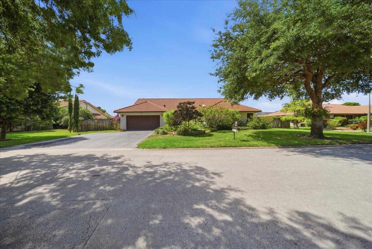 Welcome to this 4-bed, 2.5-bath single-family residence nestled in the sought-after Cypress Run without an HOA. This thoughtfully designed home spans 2,830 sq ft of living space, offering generous room for comfortable living and entertaining. The single-story layout is updated with a new kitchen in 2024 featuring double ovens, built-in microwave and tons of cabinet space, roof & impact windows 2022, new pool pump 2023, AC 2018 and water heater 2023. 2nd bedroom is used as an office space with built-in desk and murphy bed which will remain. This is a home is well cared for home. This property presents an excellent opportunity for those seeking a well-proportioned residence in an established community. DOES NOT CONVEY: Wooden wall shelves, outdoor storage containers and outside TV.