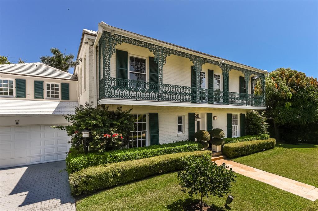 This John Volk designed Monterey-style home is perfectly located in-town on the private lake block of coveted Pendleton Lane. The pristine five bedroom, 4.5 bath residence offers formal and informal settings for both elegantly casual living and sophisticated entertaining.  Features include an elegant living room with fireplace, dining room, paneled library, Volk's signature stairways, and a sun-lit loggia that opens to the pool and terrace. The chef's kitchen was expanded to accommodate today's life-style. Two car-garage. High Elevation.