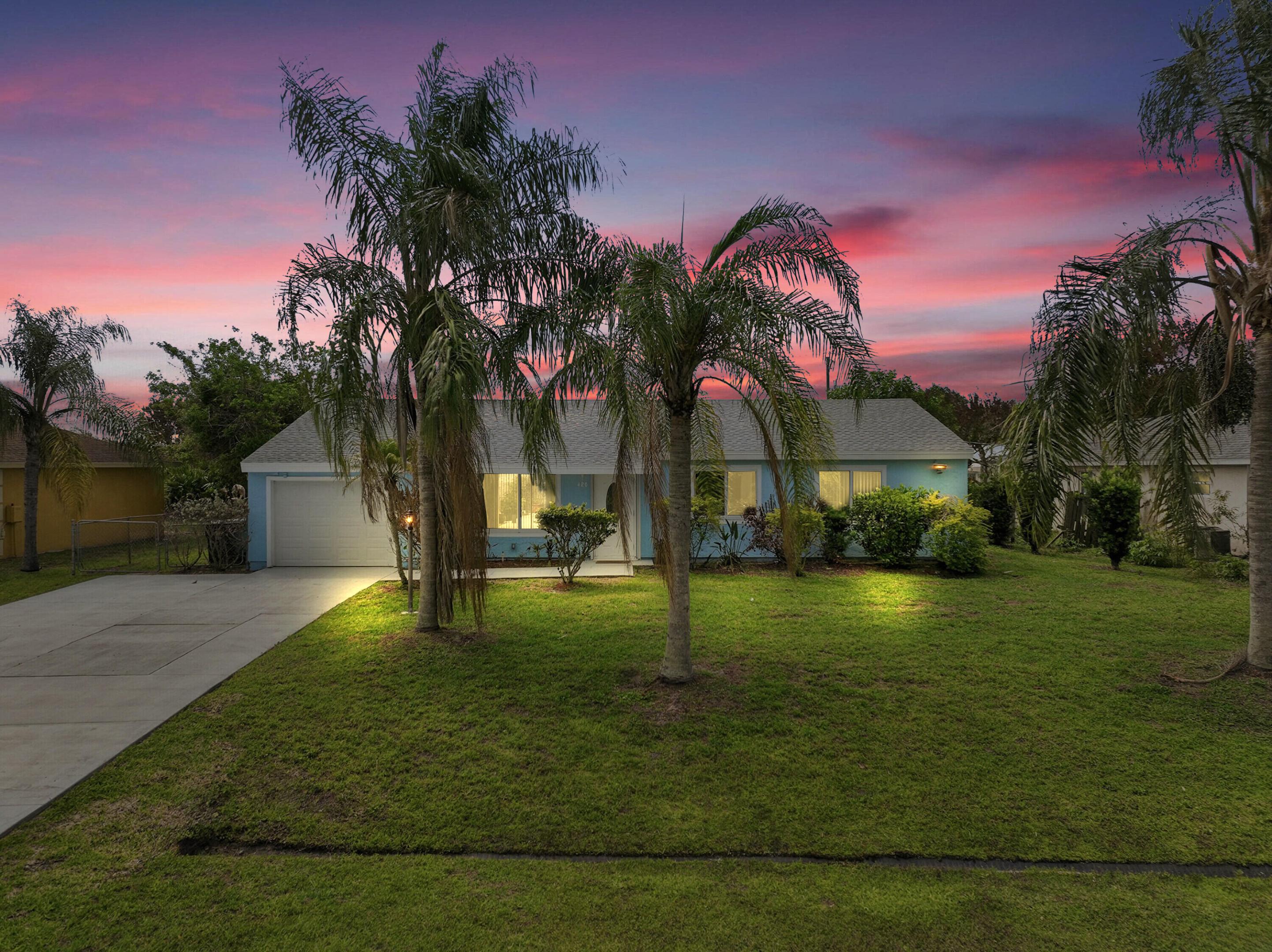 Beautifully updated 3 bedroom, 2 bath pool home in a desirable Port St. Lucie neighborhood, offering comfort, style, and peace of mind. Freshly painted inside and out. Recent upgrades include a new roof, new windows, new garage door, and new A/C, with the water heater replaced approximately 3 years ago. The home features spacious living areas, a functional layout, and updated finishes throughout. Enjoy Florida living with a huge pool and large backyard, plus a shed with electricity for extra storage or workspace. Conveniently located near shopping, dining, schools, and major roadways. This move-in ready home is a must see.