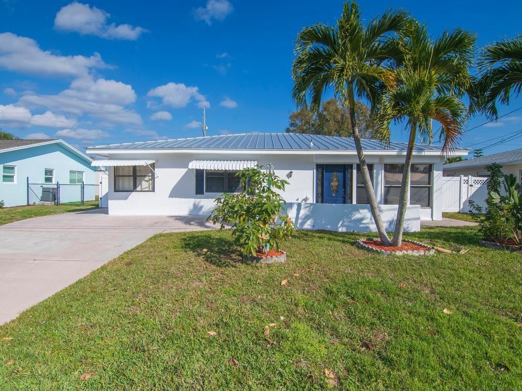 Adorable, completely furnished turn-key 3 bedroom, 3 bathroom bungalow in the charming Oakmont Park community! Close to great shopping, restaurants, and the bridges to the beach! This home boasts a newly renovated owner's suite and kitchen, fresh paint and luxury vinyl plank flooring, and multiple dining and living spaces. Flexible rental options, from a month to a season and beyond. A must-see Vero treasure! Tenant responsible for electric, utilities, and internet