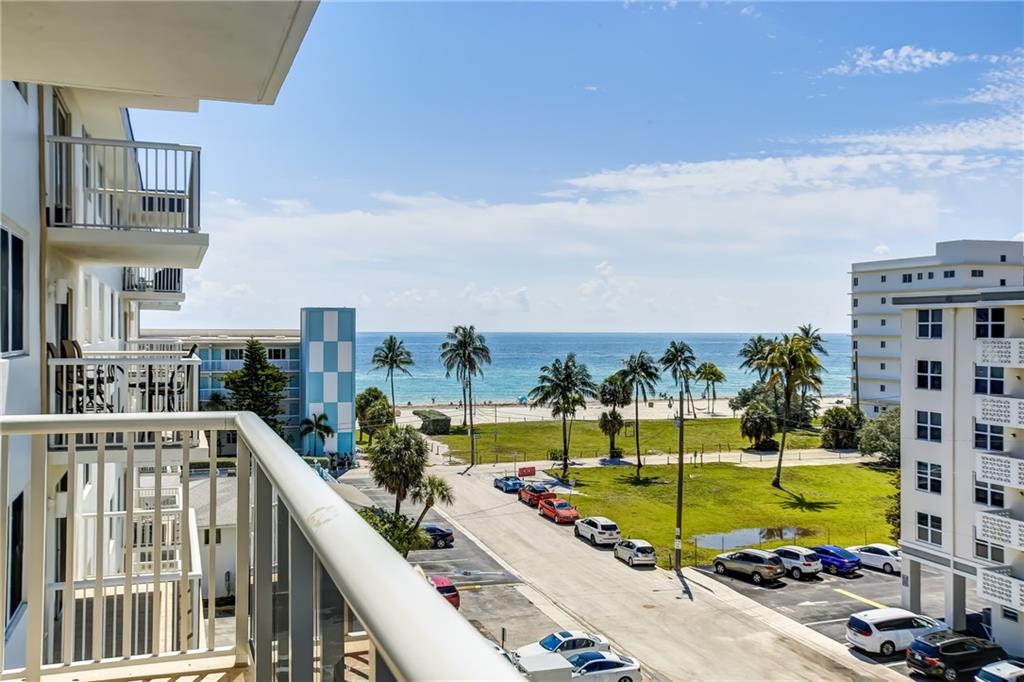 Enjoy Ocean, Intracoastal and pool views from this corner unit with wrap around balcony and railings.  2 oversized bdrms/2 bath, updated kitchen, new SS appliances, granite countertops and large island.  Modern tiles throughout living area.  Newly installed Hurricane impact windows and sliding door.  New water heater and AC installed in 2020.  The building features new roof, balcony and railings, pool, patio and barbecue area.  Use of common laundry room, community room and individual storage unit.  The condo has new roof and recently passed the 40 Yrs. Certification. No rentals.  GREAT LOCATION. Close to boardwalk, shopping, restaurants, Aventura Mall, Gulfstream Park and Racing, Ft. Lauderdale Airport and I-95.  Publix walking distance is being built.