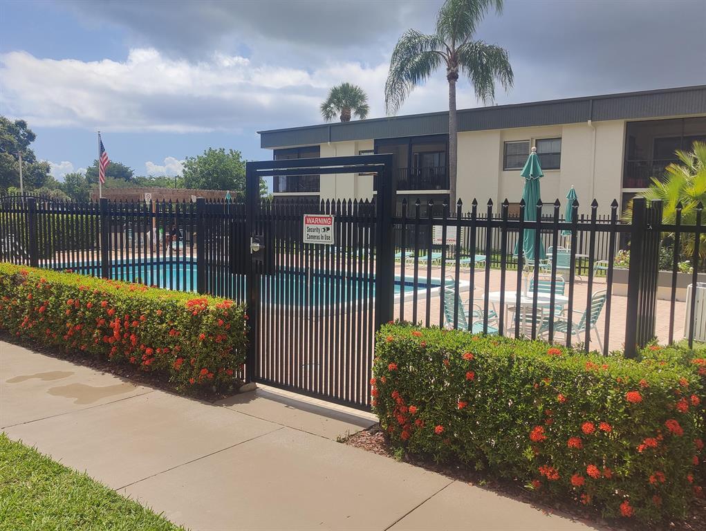 WELCOME TO THIS AMAZING MAINTAINED 2 BR, BATH CONDO IN DESIRABLE TOWN GREENE COMMUNITY, IDEALLY LOCATED JUST MINUTES FROM DEERFIELD BEACH, SHOPPING, DINING, PARKS, AND MAJOR HIGHWAYS. THIS LIGHT FILLED RESIDENCE FEATURES A SPACIOUS SPLIT BED FLOOR PLAN, AN OPEN LIVING DINING AREA, AND A PRIVATE SCREENED BALCONY WITH PEACEFUL N FACING EXPOSURE THAT PROVIDES SOFT NATURAL LIGHT THROUGHOUT THE DAY. THE FOLLOWING UNIT FEATURES THE AC-2019, HOT WATER HEATER IS 2019, PAINT 2026, HEATED POOL, COMMUNITY ROOM, UNIT HAS NEWE WASHER AND DRYER (2025) DISHWASHER IS ALSO NEWER. TOP FLOOR STORAGE, ASSIGNED PARKING SPACE. ASSN IS RESPONSIBLE FOR ALL ROOFS IN COMMUNITY. WILL GO FAST, AGRESSIVELY PRICED. SOME IMAGES HAVE BEEN VIRTUALLY STAGED. FURNISHINGS AND DECOR ARE FOR ILLUSTRATION PURPOSES ONLY.