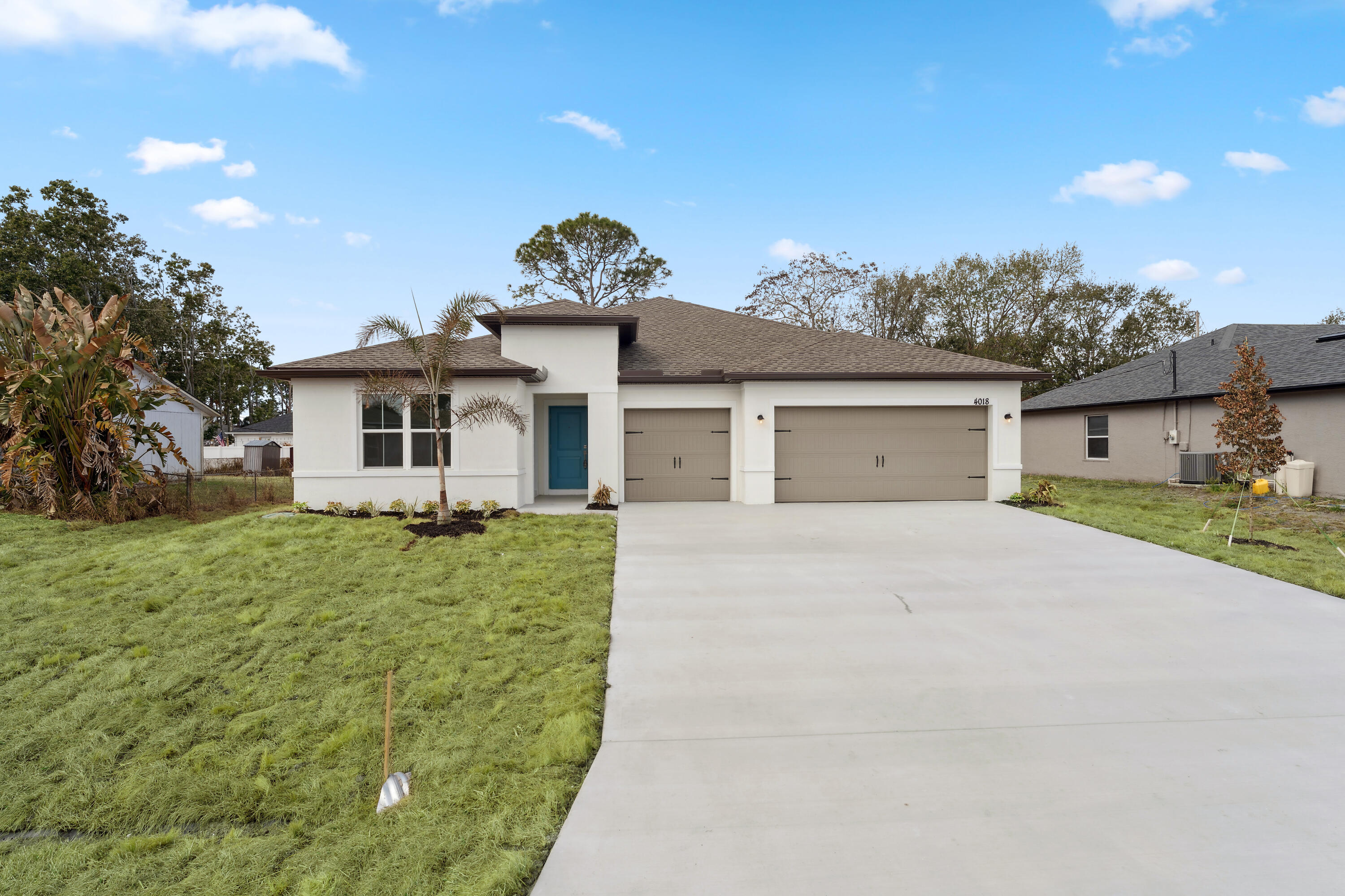 Versatile Living with Extra Suite Plus - No HOA and Impact Glass throughout entire home!

Located in the desirable Torino area of Port St. Lucie, this beautifully designed Aegean-model home at 4018 SW Kallen Street offers exceptional flexibility and modern style. Its standout feature is the spacious Extra Suite Plus, complete with a private bath and living area—perfect for multigenerational living, long-term guests, or a private work-from-home retreat.

Styled in the clean and contemporary Elements Look, the home showcases a sleek and cohesive aesthetic throughout. The kitchen impresses with Sinclair White cabinetry, a GE smart cooking suite, and a generous island that flows effortlessly into the open-concept great room and dining area, creating a bright and connected living space. Just off the dining room, a cozy patio provides the ideal spot for relaxed outdoor gatherings.

The primary suite serves as a tranquil escape, featuring a luxurious primary bath and a spacious walk-in closet for comfortable everyday living.

Additional Highlights Include:
- Whole-house impact glass for enhanced safety and peace of mind
- Extended driveway offering extra parking space
- Included home technology suite for modern convenience
- No HOA, giving you added freedom and savings

Combining style, comfort, and thoughtful design, this home delivers the versatility today's buyers are looking for.