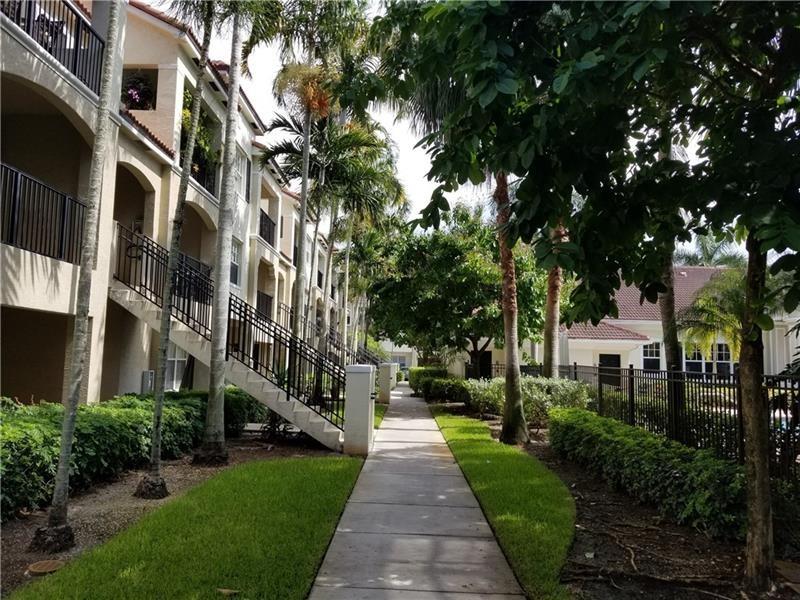 LOWEST PRICED 3/2, 1-CAR GARAGE TOWNHOUSE IN EXCELLENT AREA IN CORAL SPRINGS CLOSE TO MAJOR ROADS AND PLENTY OF SHOPPING, POPULAR POINCIANA PLACE - A GATED RESORT STYLE COMMUNITY THAT FEATURES A GRAND CLUBHOUSE WITH MANY AMENITIES. THE UNIT HAS ITS OWN GARAGE AND PRIVATE ENTRANCE TO THE SECOND FLOOR TO AN OPEN FLOORPLAN WITH LAMINATE FLOOR THROUGHOUT, OPEN KITCHEN, INVITING SCREENED IN PATIO, SPLIT BEDROOMS, WALK-IN CLOSETS, AND MORE.