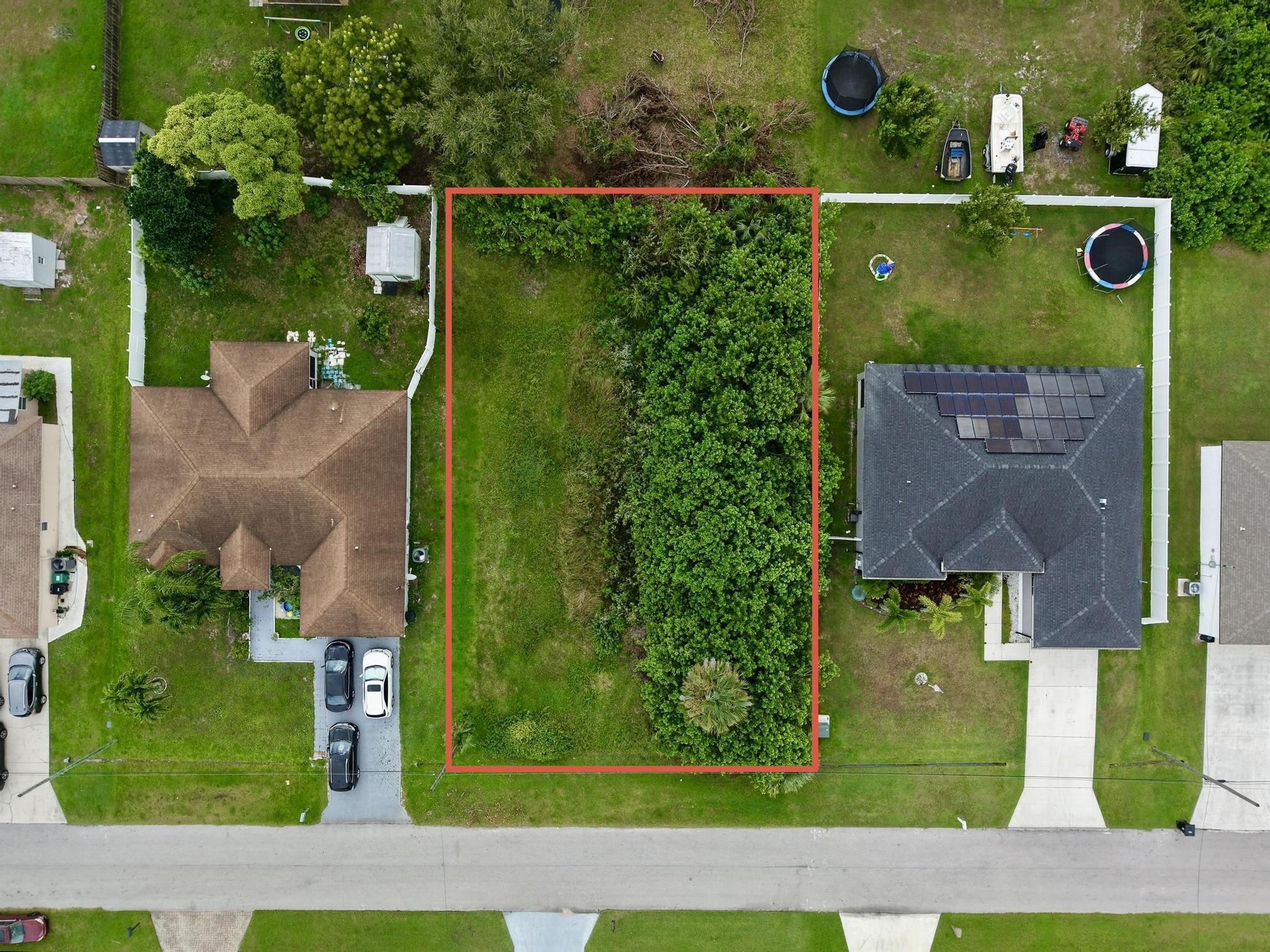 Build Your Dream Home Near Tradition - Prime Location!

Discover the perfect canvas for your future home on this partially cleared lot located in a well-established and desirable neighborhood. Enjoy the convenience of being just minutes from Tradition, where you'll find an abundance of shopping, restaurants, hospitals, and entertainment options to suit every lifestyle.

Families will appreciate the close proximity to schools, parks, and the public library. For commuters, quick and easy access to community transport, 95, Florida Turnpike via Becker Road ensures smooth travel throughout the region. Located within 45 mins of Palm Beach International Airport. 

Don't miss this opportunity to create the home you've always wanted in a thriving, connected neighborhood!