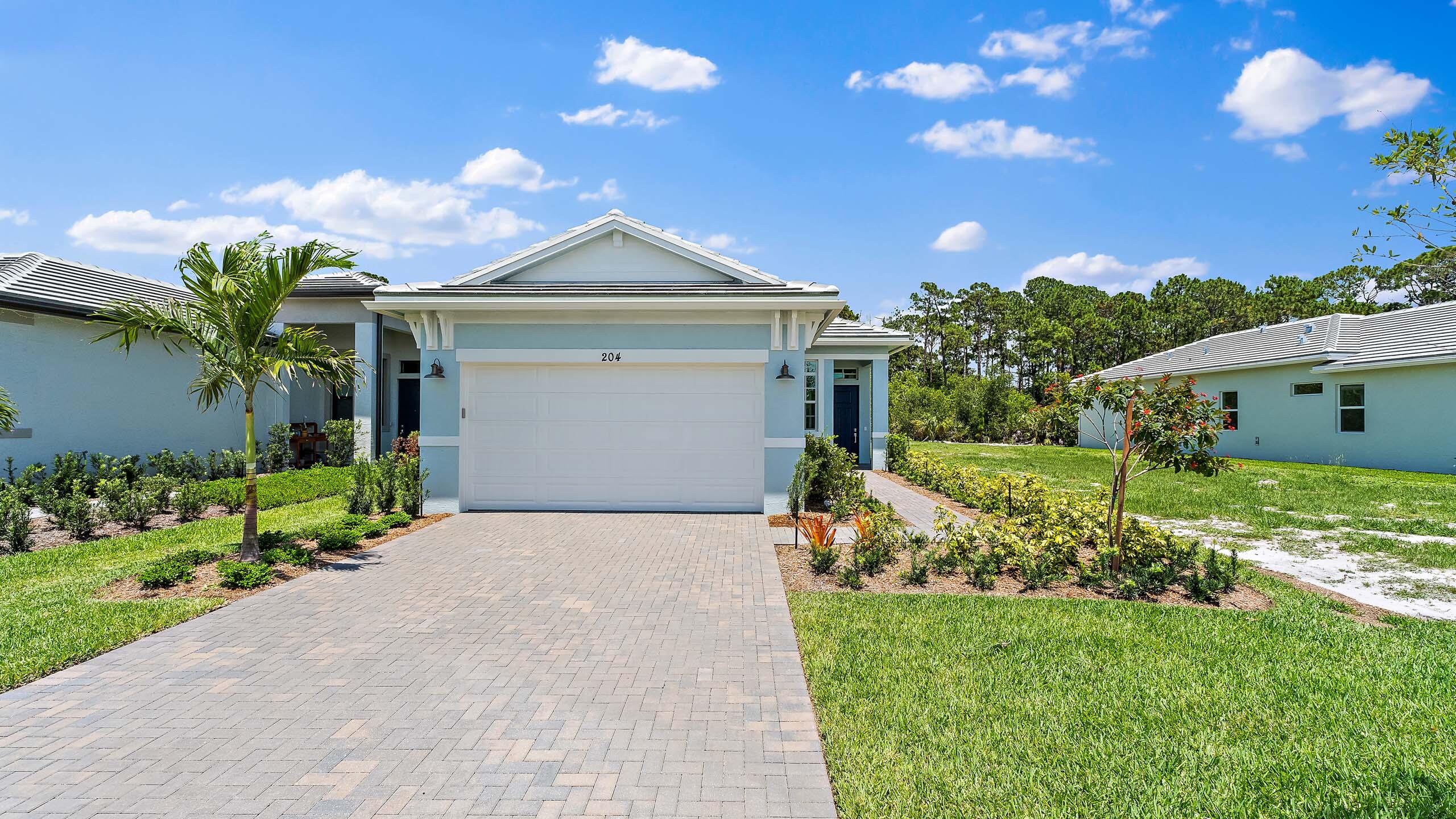 Move in Ready! Experience luxury living at Rivella by Kolter Homes along the St. Lucie River, just minutes from the Atlantic beaches. The Allison features 2 beds/2 baths, flex room, and a 2-car garage with a 4' extension for added storage. The open main living area showcases 12' x 10' sliding glass doors. 4' extended lanai and 4' owner's suite extension provide extra comfort and livability. Interior finishes are crisp and modern with white cabinetry and light, fresh design selections throughout.