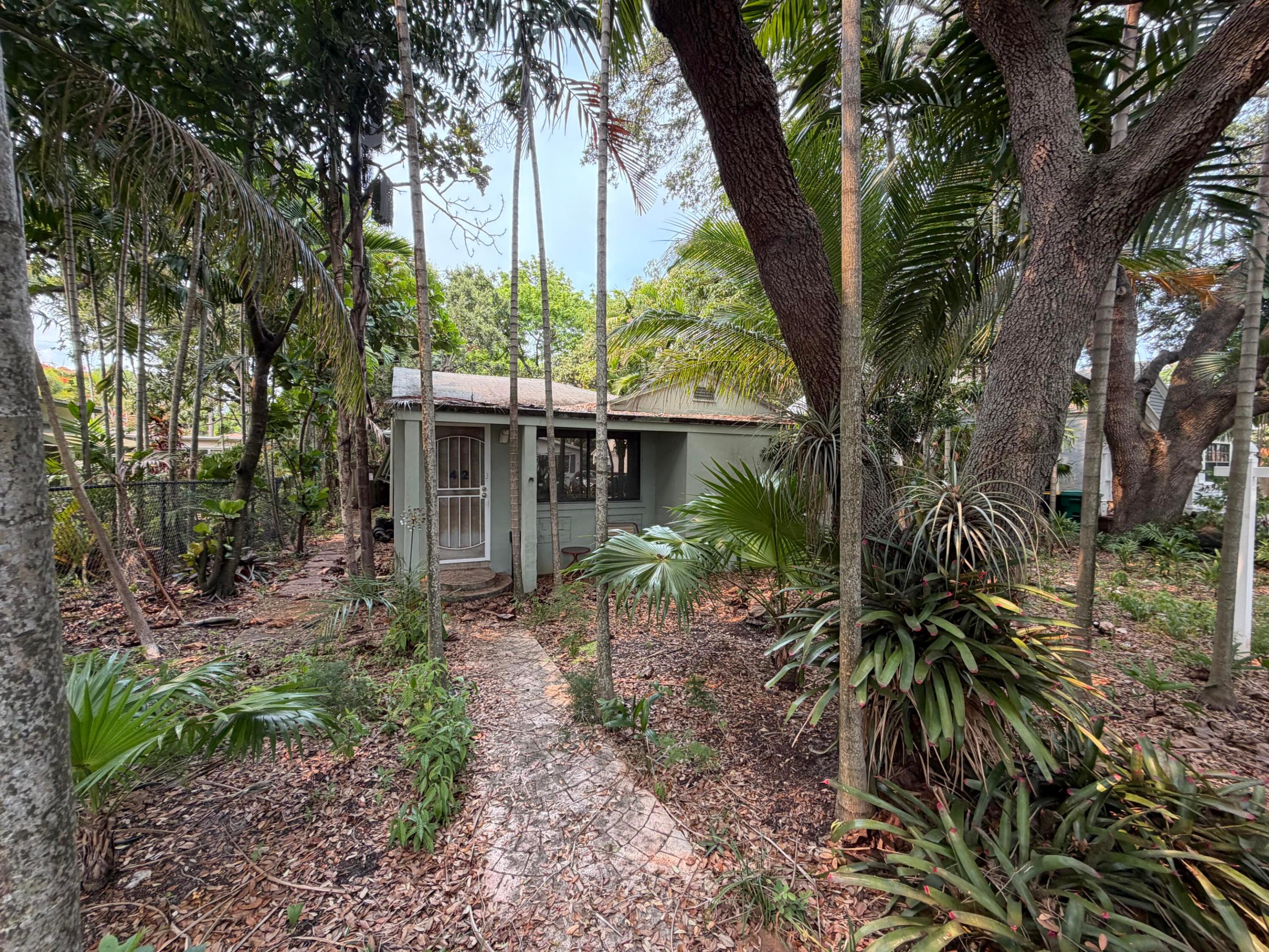 Welcome to this charming three-bedroom, three-bathroom single-story residence located in Dania Beach. This well-proportioned home offers 1,320 square feet of finished living space thoughtfully designed across one level for convenience and accessibility. The layout provides distinct spaces for relaxation, entertaining, and rest. This property presents an excellent opportunity for those seeking a practical home in Dania Beach. Nicely landscaped yard with privacy fence. Home needs some updating, great opportunity to update it to your liking and tastes.