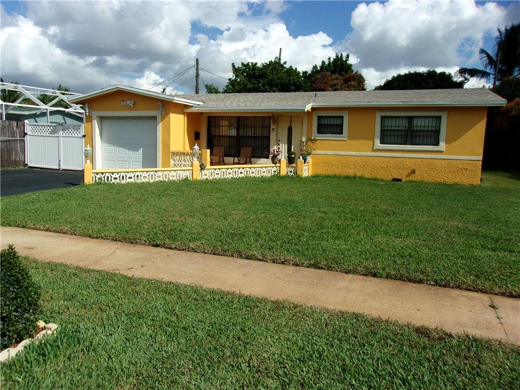 Don’t miss this spacious, neatly kept 2/2 with den, located in a family oriented neighborhood in Lauderhill-no HOA. Property is within close proximity to Florida Medical, public transportation, restaurants and shopping. Renovated kitchen has sunken lights and is equipped with stainless steel appliances- breakfast nook off kitchen. The 1 car garage is neatly organized with storage shelves, but can be easily converted back to it’s original use. Newly installed roof, upgraded electrical system and hurricane shutters in place -home is qualified for insurance (hurricane) discounts. Exterior of home is set up for entertainment. Spacious backyard with fruit trees has enough space for a pool. This home is suitable for a primary residence or investment property.