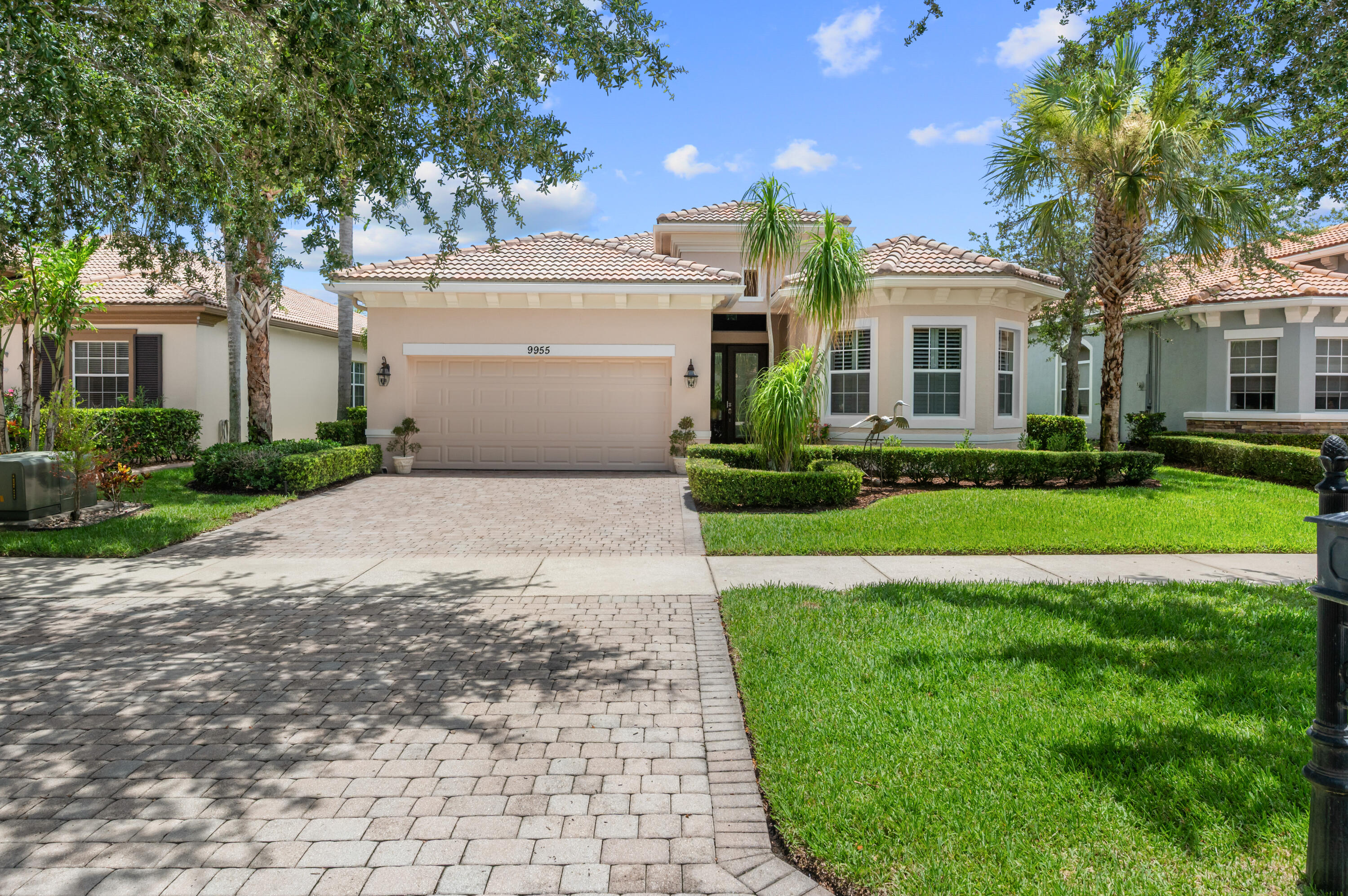 Beautiful Florenza model with a serene lake view overlooking a bird sanctuary from the rear Screened Porch. This home has 3 bedrooms, 2.5 baths with a 2 car garage. The kitchen has 42'' cabinets with under cabinet lighting, GE Stainless Steel Appliances, & a large peninsula with granite countertops. The Kitchen & Family Room are light & bright. Coffered ceilings in the Foyer, Living Room, Family Room and Primary Bedroom add to the luxury feel of this home. The Primary Bathroom has Granite Countertops & a Roman Tub. Primary Bedrooms has walk in closets with cabintetry to maximize storage. The home has impact glass windows and doors for hurricane protection. PGA Verano Community has Resort Amenities. Some of the amenities include Recreation Clubhouse Talavera, Resort Style Pool, Indoor Pool, Resistance Pool, Fitness Center, Tennis Courts, Pickleball Courts (27). There is a golf cart path to the PGA Golf Club which offers 3 Public Championship Golf Courses and Private Course (membership optional). Just minutes from Shopping, Restaurants, Activities, Entertainment & even Home of the New York Mets Spring Training at Clover Park in Saint Lucie West.