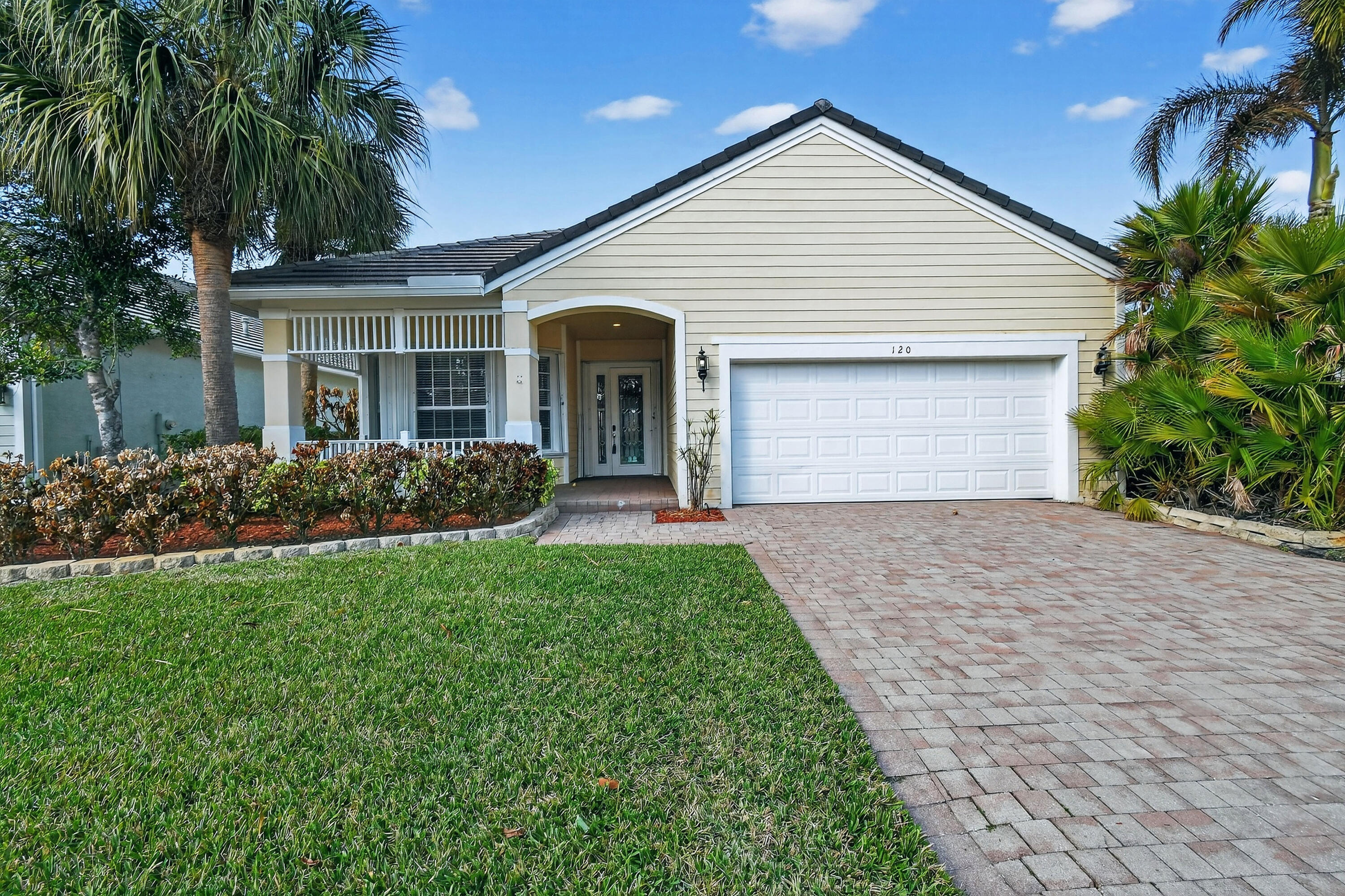Great opportunity! 3/3 with a Den!Don't miss out on this sought after LAKE VIEW Key West Style home in the private, gated community, of Magnolia Lakes! This beautifully maintained former builder's model includes a full house generator, gas stove, GE appliances, vaulted ceilings, custom crown molding, seamless tile flooring in living areas and wood flooring throughout the rooms. Primary Room boasts dual vanities, a soaking tub, a separate shower, and much more! Relax on the covered, screened lanai overlooking the Lake! Located in a resort-style, gated community with incredible amenities, including a resort style pool, community room, game room, fitness center, tennis, and bocce ball! HOA includes complete landscaping and internet. Don't miss this one!