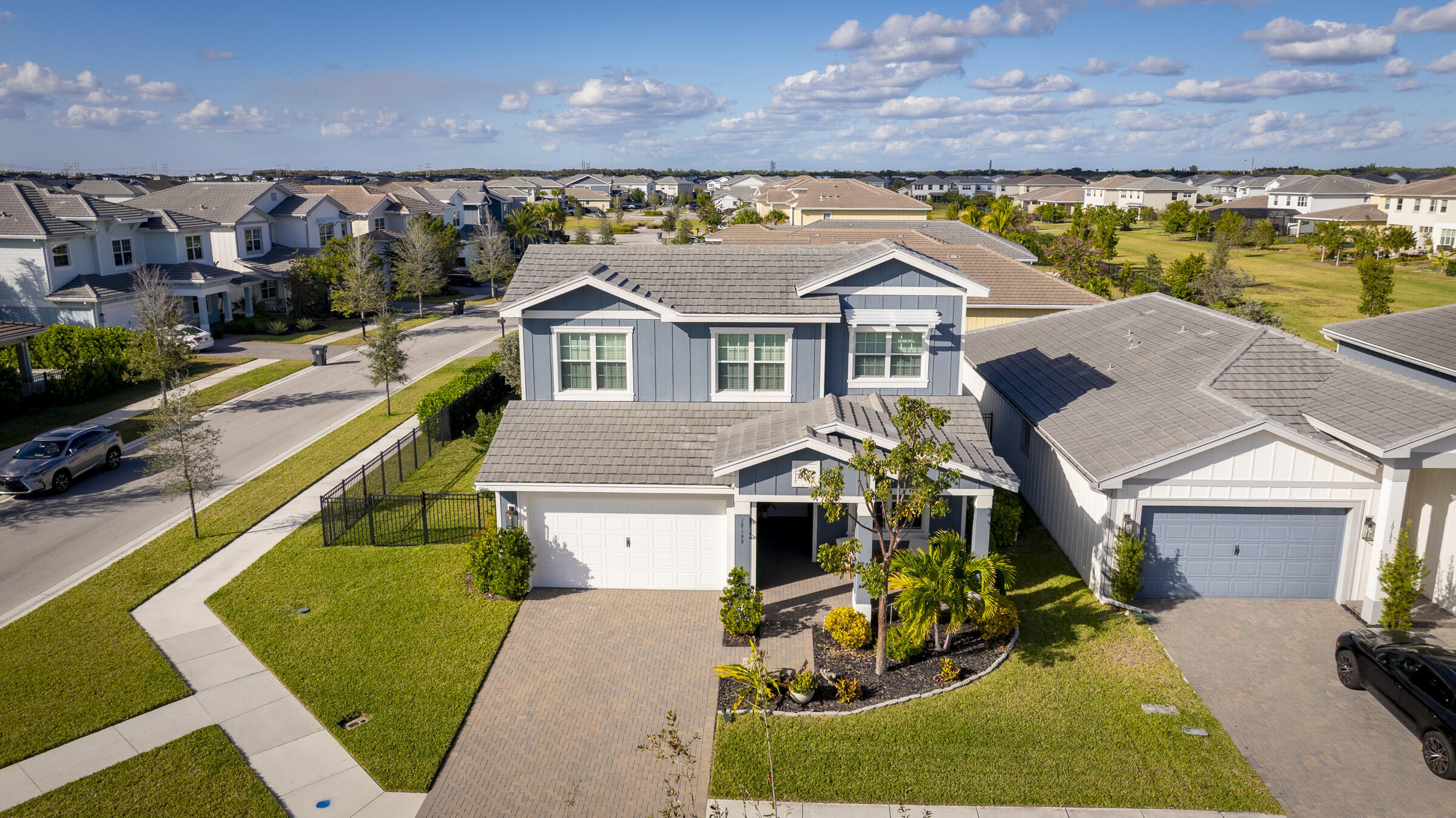 Welcome to this stunning 2022-built residence in the highly sought-after Arden community of Wellington. Situated on a premium corner lot, this beautifully designed 4-bedroom, 3-bath home offers over 2,500 square feet of thoughtfully crafted living space with an open-concept floor plan perfect for both everyday living and entertaining.  The spacious chef's kitchen features a large center island, gas range, abundant cabinetry, and seamless flow into the dining and living areas. The desirable split-bedroom layout provides privacy for guests, while the luxurious primary suite offers a peaceful retreat with generous walk-in closets and a spa-inspired bath.   Step outside to enjoy the covered patio and expansive yard with plenty of room for a pool, outdoor kitchen, or simply relaxing and enjoying South Florida living. Located within Arden, one of Palm Beach County's premier lifestyle communities, residents enjoy resort-style amenities including a clubhouse, fitness center, resort pool, tennis courts, pickleball courts, miles of walking trails, playgrounds, and a working farm. Zoned for top-rated schools and conveniently located near shopping, dining, and major highways. This is your opportunity to own a nearly new home in one of Wellington's most desirable communities. Schedule your private showing today.