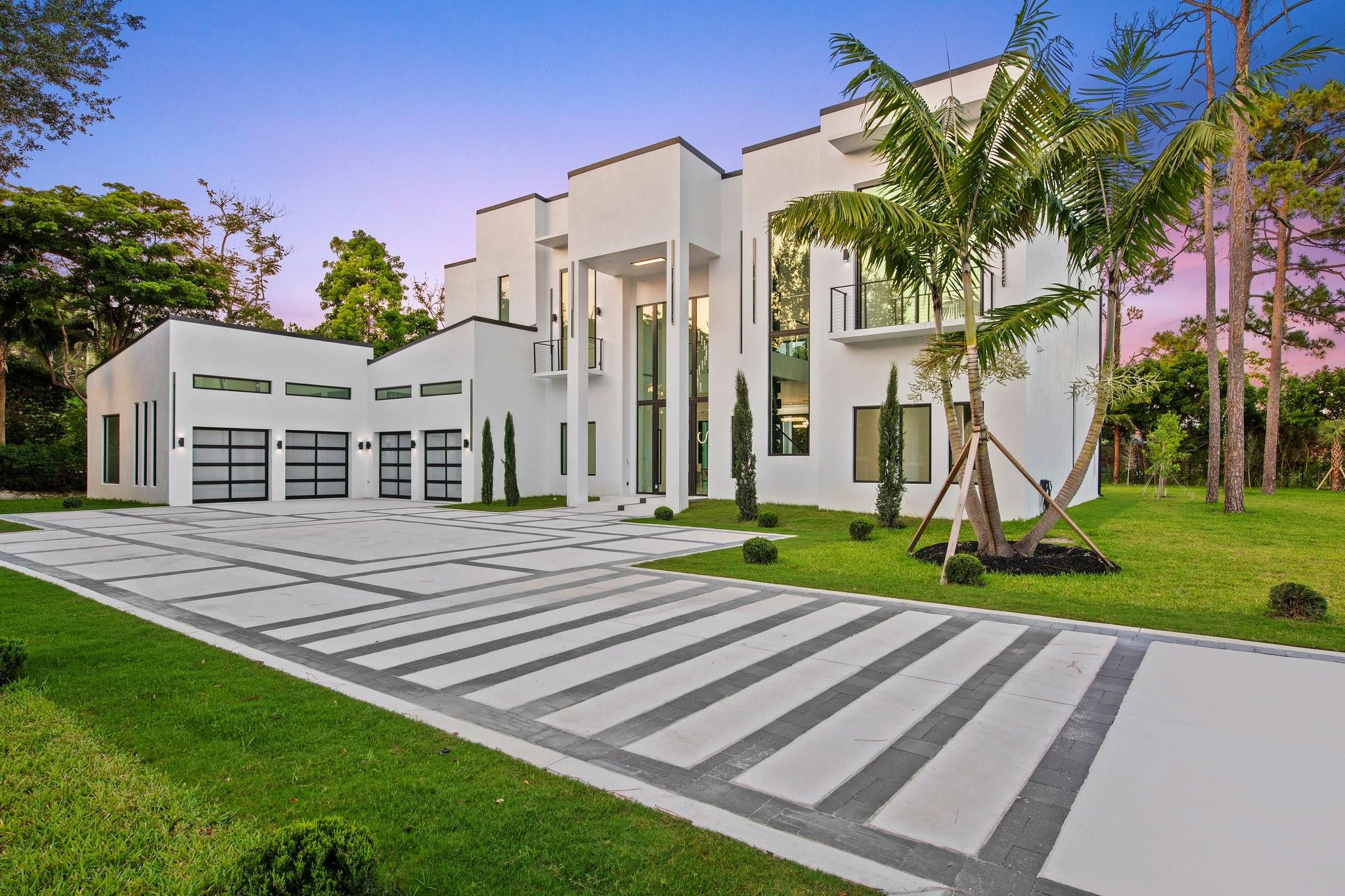 Welcome to modern luxury living at its finest in this new construction home. This stunning residence boasts 6 beds, 8 baths, and an expansive 7100 sqft of living space, in a boutique gated community. Step inside to discover a wealth of upscale features, including sleek floors that flow throughout the home. The gourmet kitchen is perfect for any culinary enthusiasts, while the private in-law suite provides flexibility for multi-generational living arrangements. Outside, the heated pool is an inviting oasis, offering year-round enjoyment. This home exudes modern elegance, with spacious living areas and luxurious finishes that elevate everyday living. Whether you're hosting gatherings or enjoying quiet moments of relaxation, this home offers the perfect blend of sophistication and comfort.