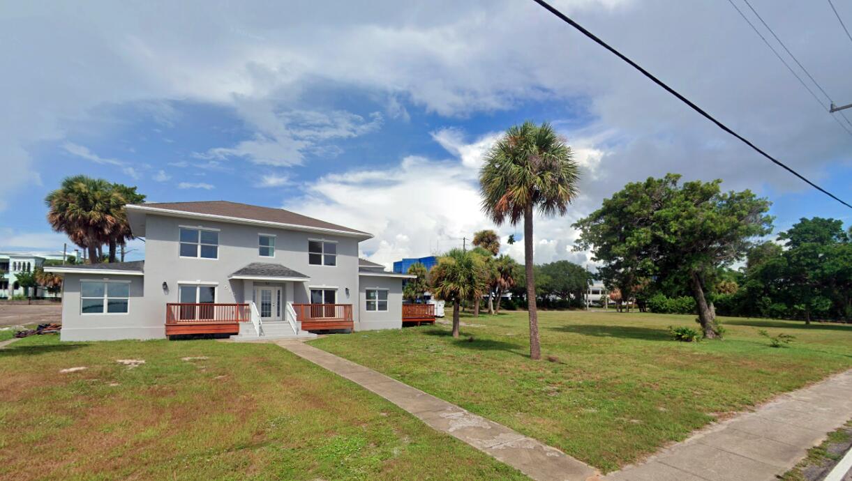 Rare waterfront opportunity on Indian River Drive overlooking Fort Pierce Inlet. Set on 1.6 acres, this property with renovations that a near completion includes a ±4,154 SF two-story lodging building with multiple guest rooms and common areas, plus a detached ±1,506 SF studio ideal for an owner or additional accommodations. The property features a dock with direct water access and includes an extra ±0.80-acre parcel for potential expansion (subject to approvals). Minutes from downtown Fort Pierce, with easy access to US1, I-95, and the Turnpike.